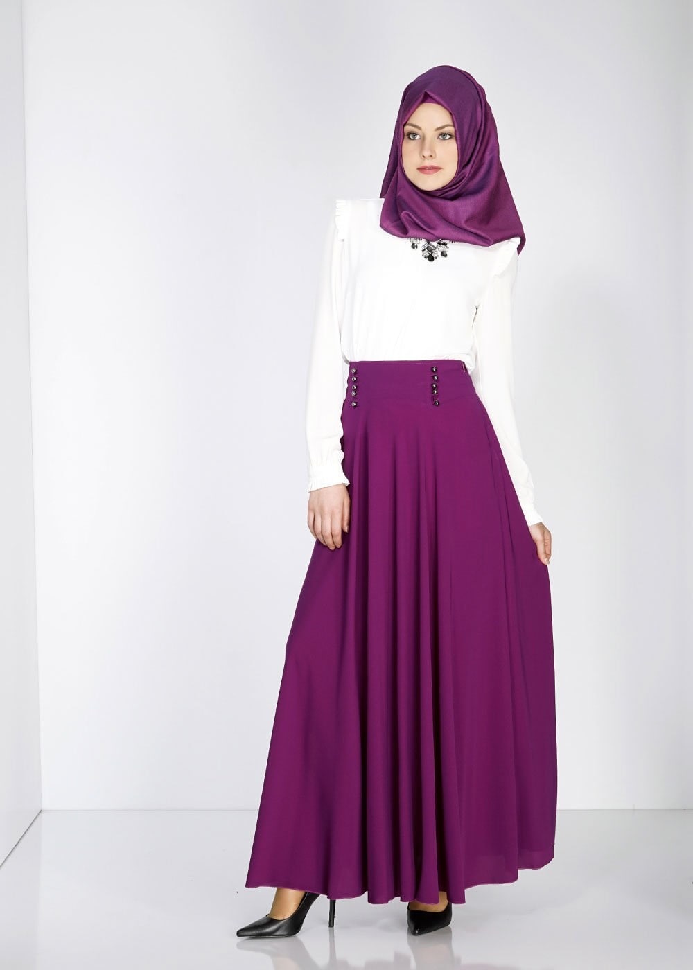 Tesettür giyim MOR DÜĞME DETAYLI VOLANLI ETEK 6671