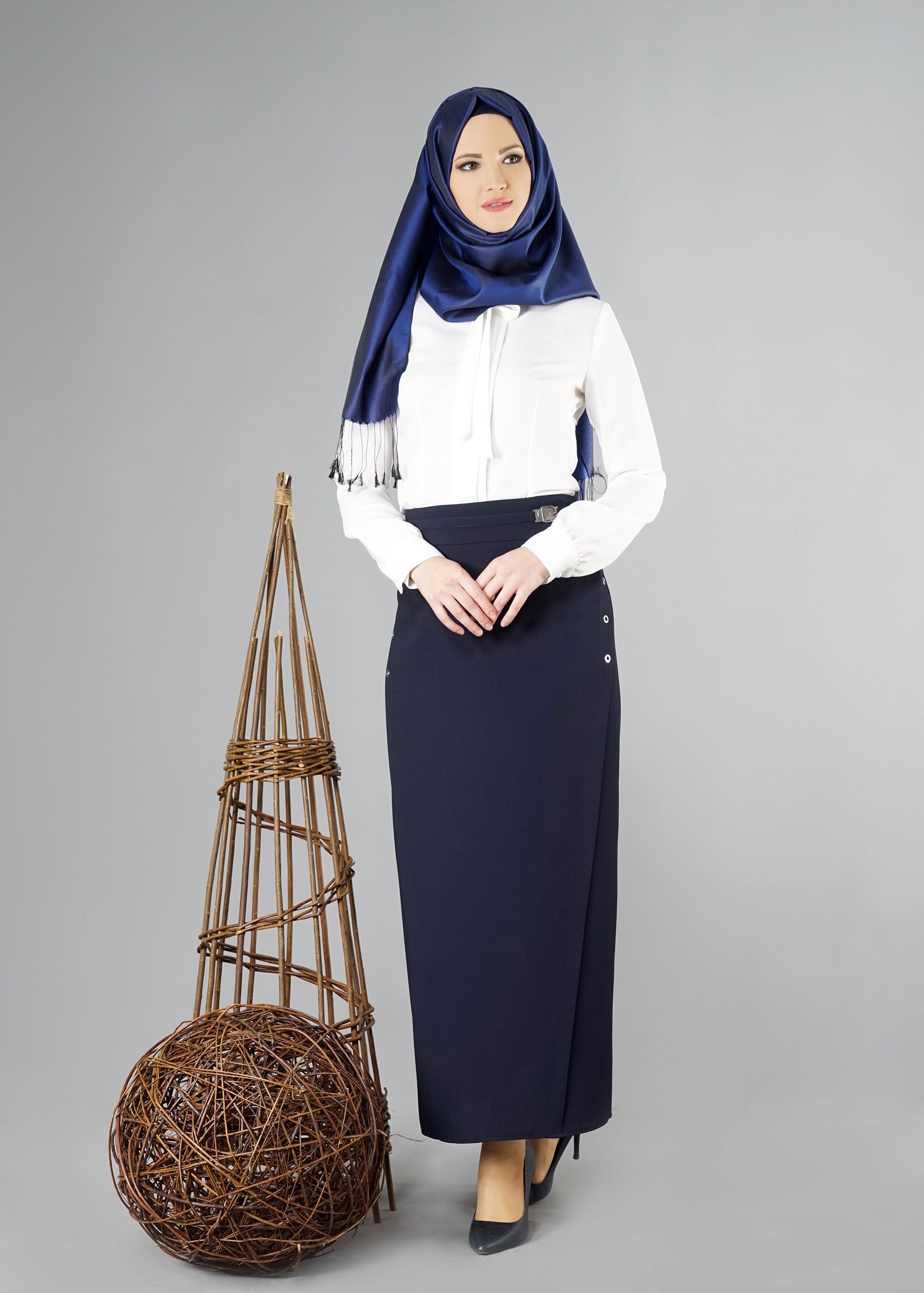 Tesettür giyim LACİVERT KUŞGÖZÜ DETAYLI ETEK 6941