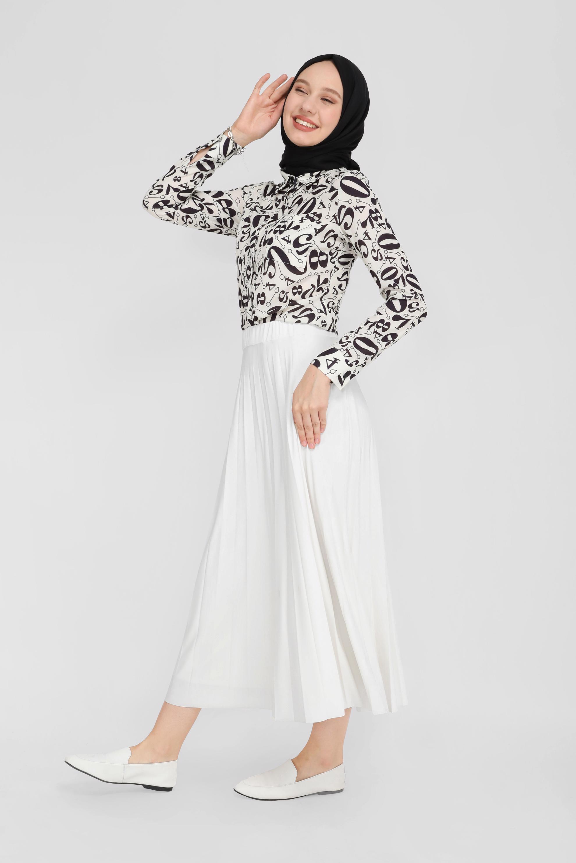 Tesettür giyim SİYAH DESENLİ GİZLİ DÜĞMELİ BLUZ 4324