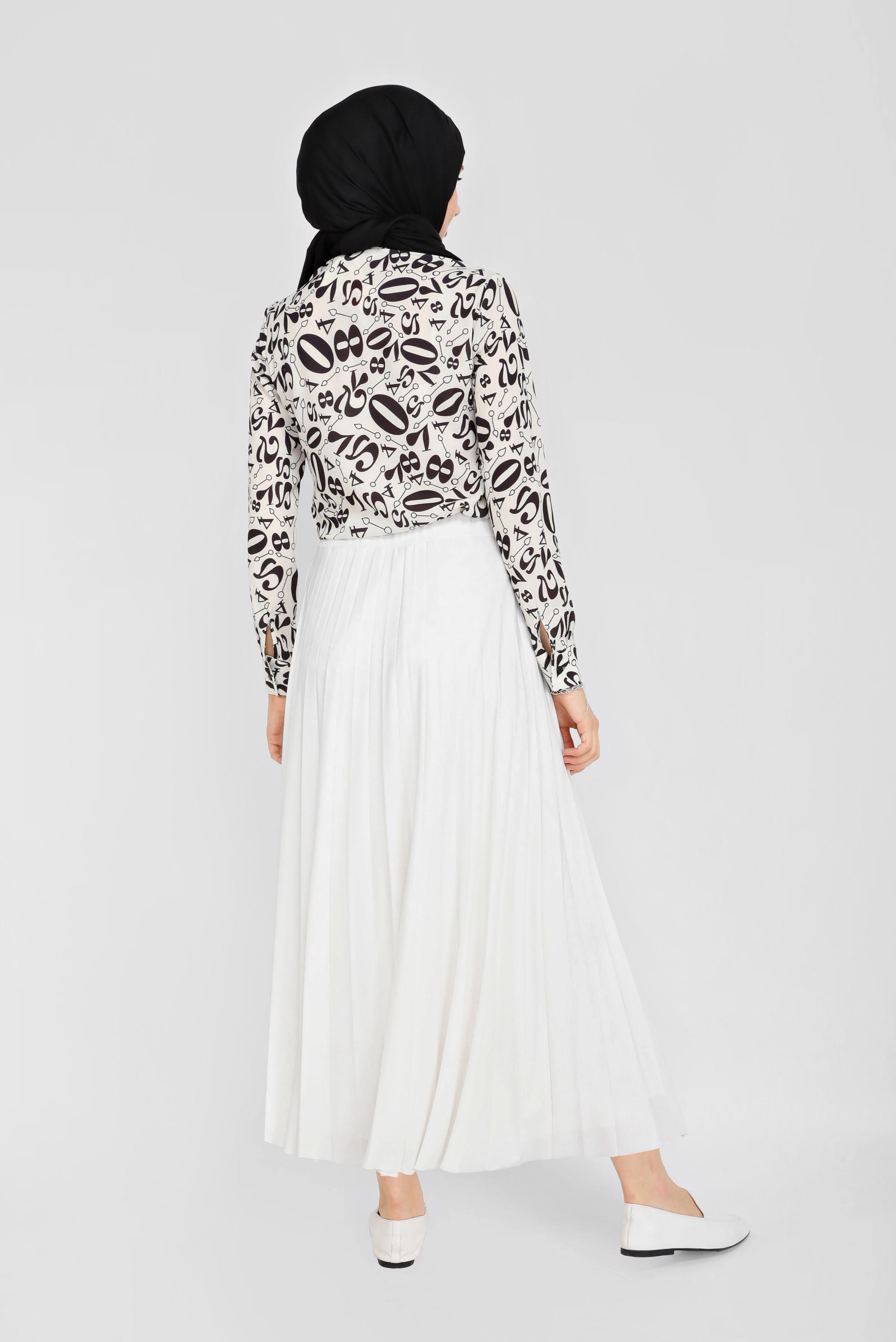 Tesettür giyim SİYAH DESENLİ GİZLİ DÜĞMELİ BLUZ 4324