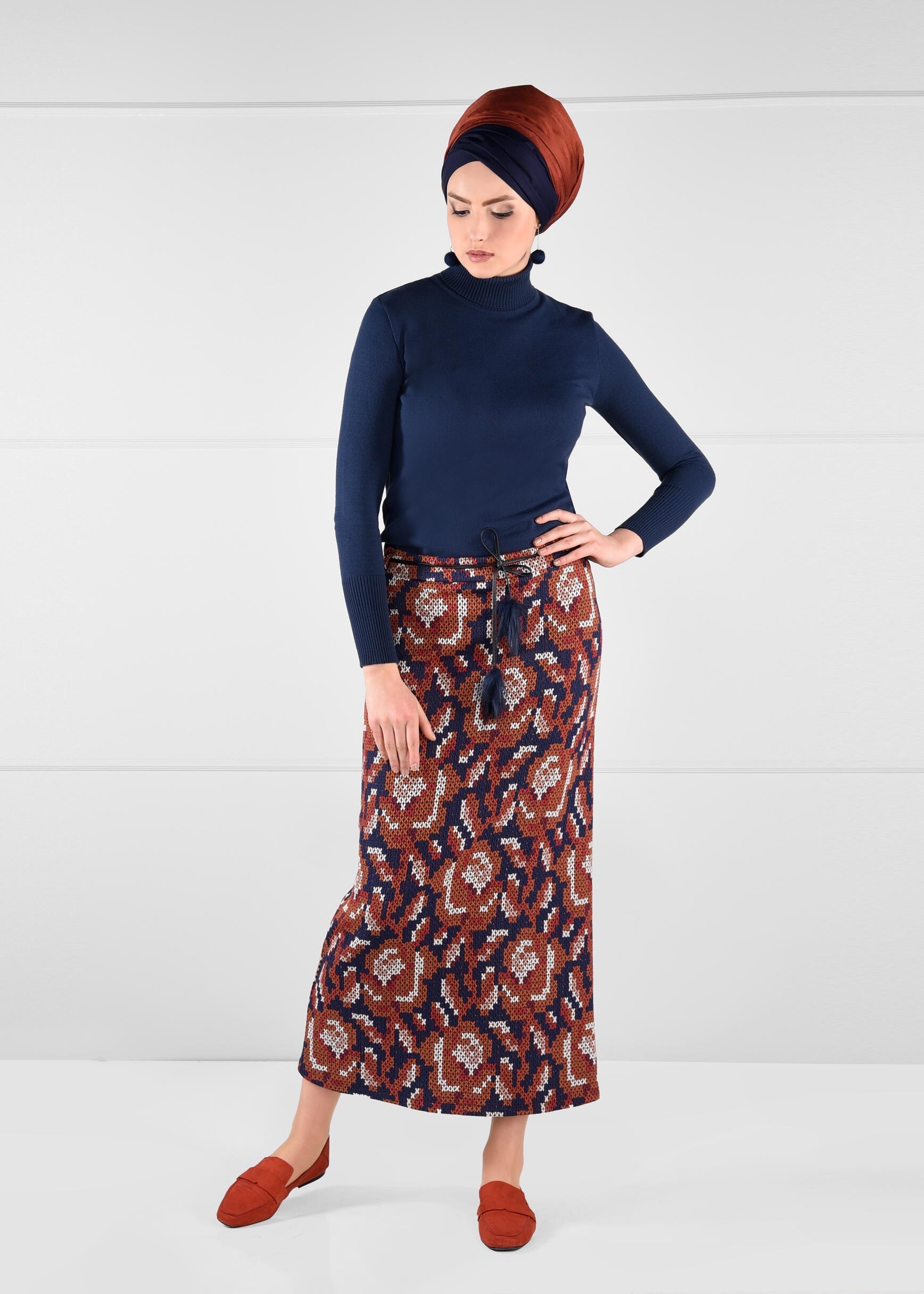 Tesettür giyim LACİVERT PÜSKÜLLÜ JAKAR ETEK 6140 