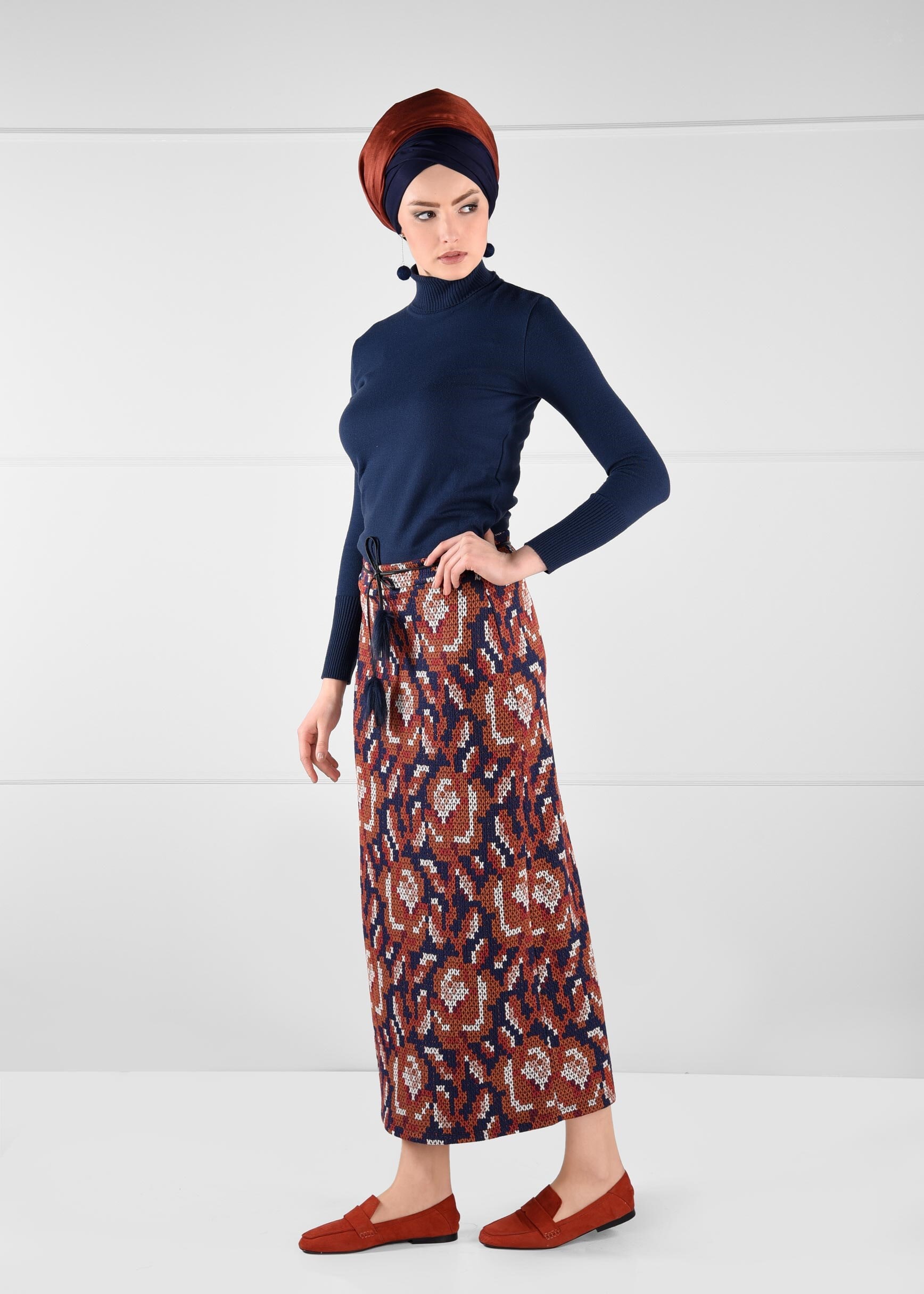 Tesettür giyim LACİVERT PÜSKÜLLÜ JAKAR ETEK 6140 