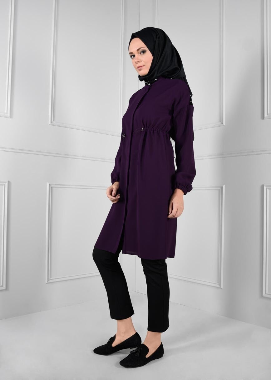 Tesettür giyim MOR BELDEN BÜZGÜLÜ OMUZLARI ZIMBA DETAYLI TUNİK 4635