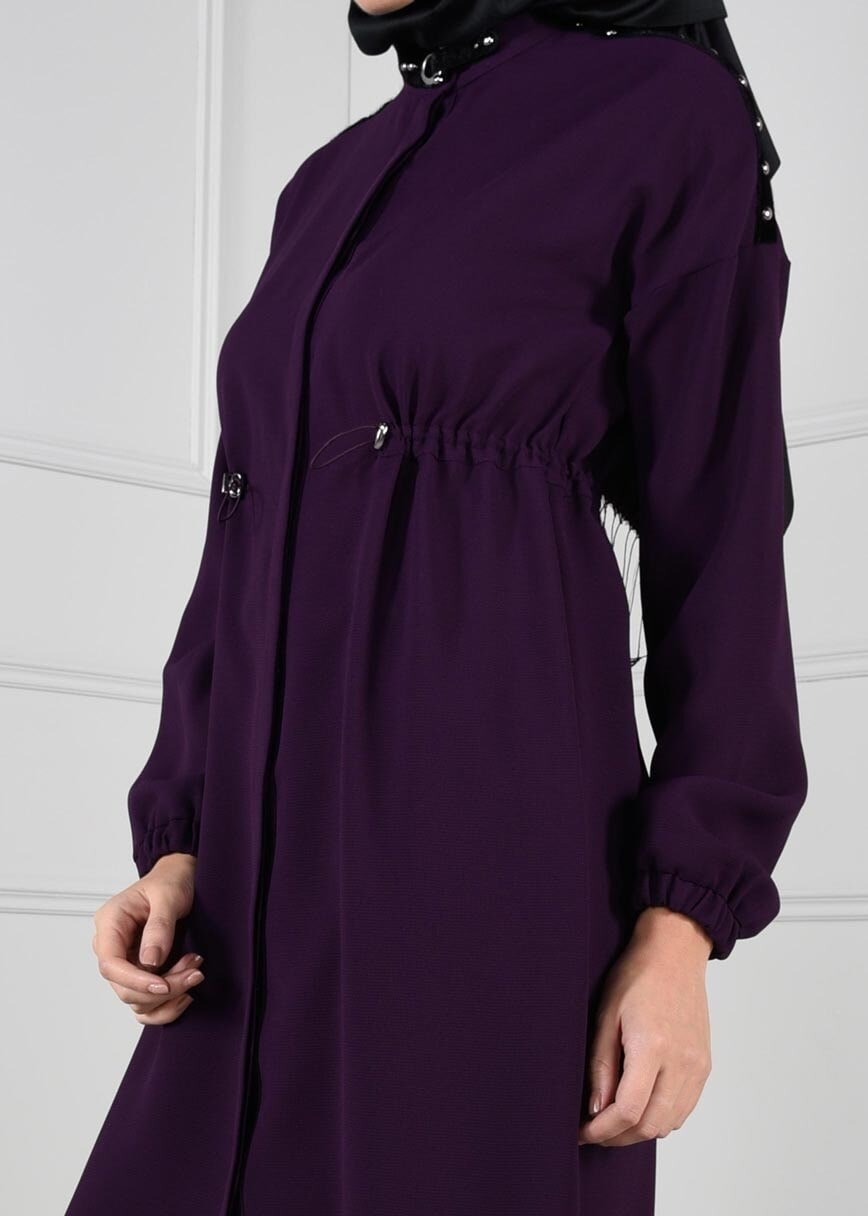 Tesettür giyim MOR BELDEN BÜZGÜLÜ OMUZLARI ZIMBA DETAYLI TUNİK 4635