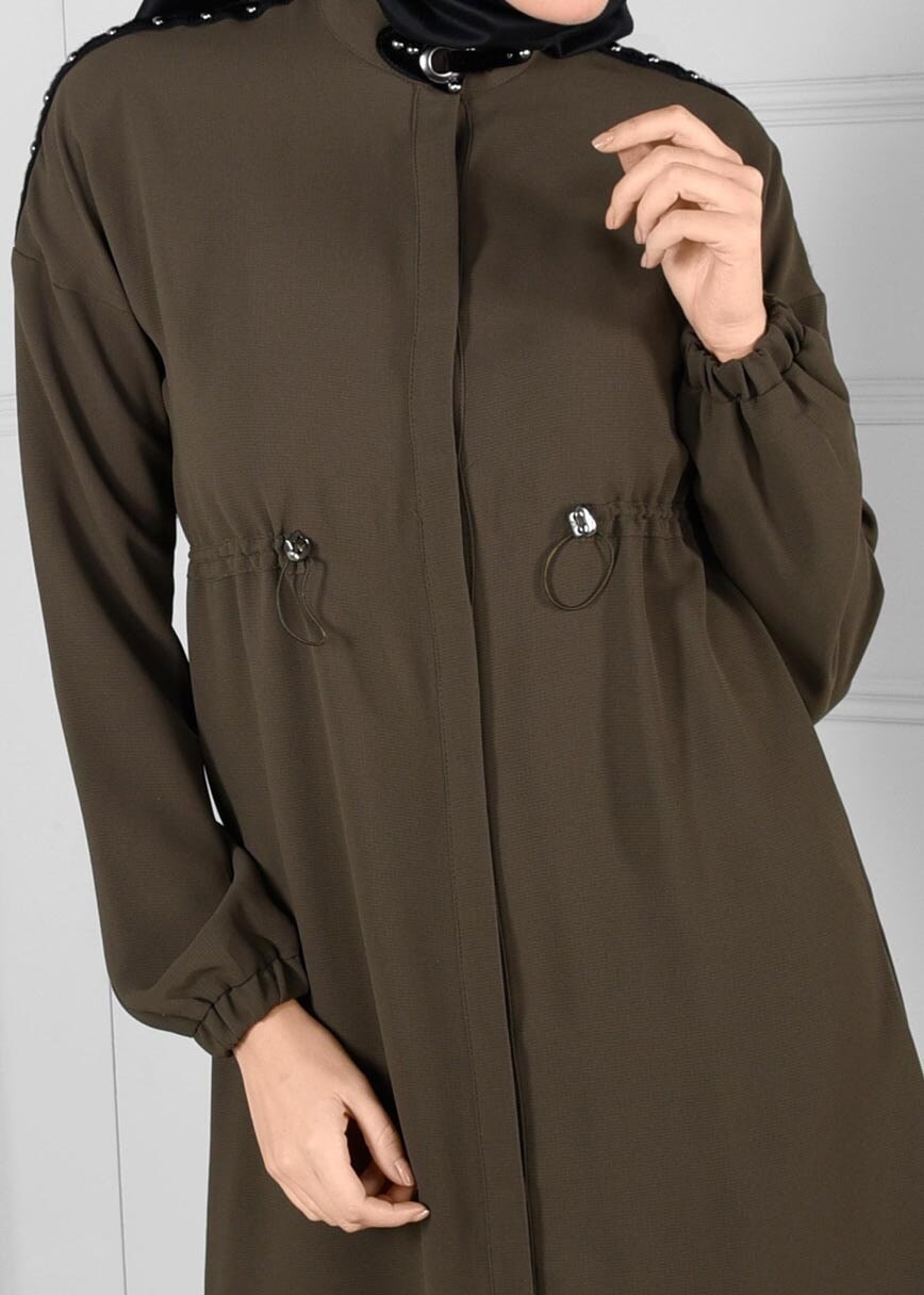 Tesettür giyim HAKİ BELDEN BÜZGÜLÜ OMUZLARI ZIMBA DETAYLI TUNİK 4635