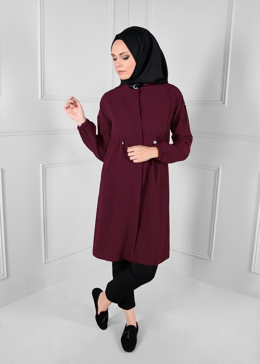 Tesettür giyim MÜRDÜM BELDEN BÜZGÜLÜ OMUZLARI ZIMBA DETAYLI TUNİK 4635