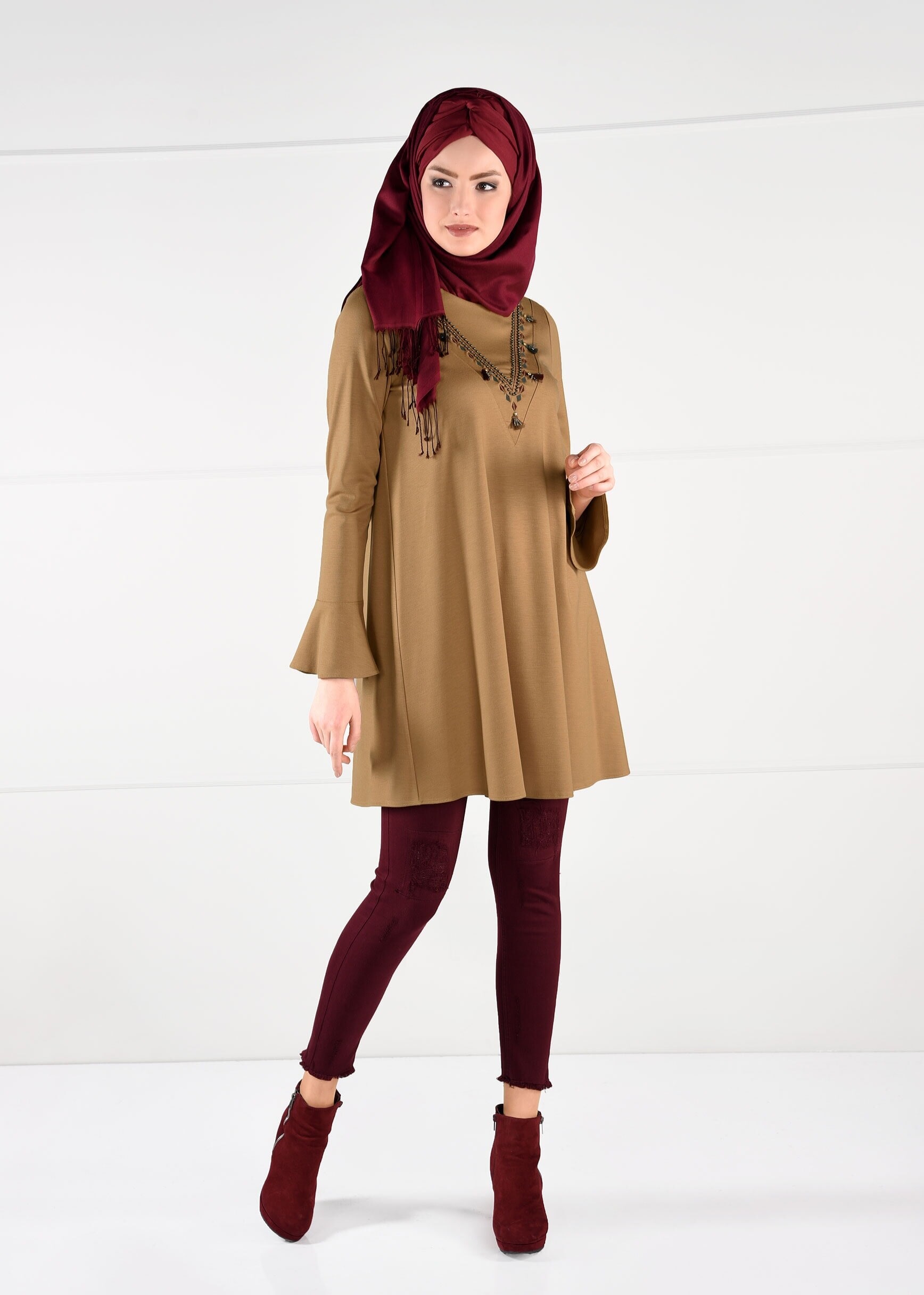 Tesettür giyim SARI PÜSKÜLLÜ SALAŞ KESİM TUNİK 4680