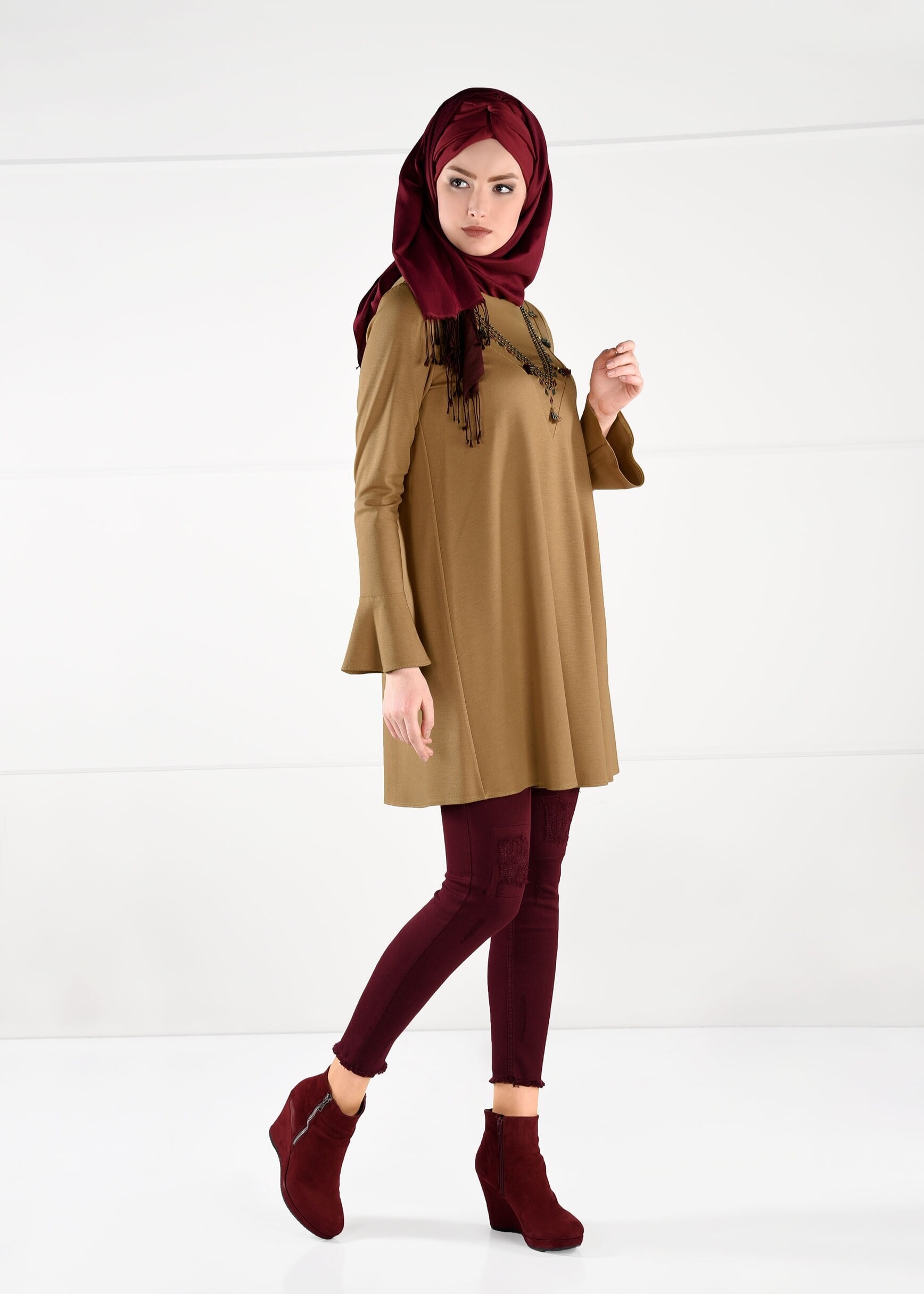 Tesettür giyim SARI PÜSKÜLLÜ SALAŞ KESİM TUNİK 4680