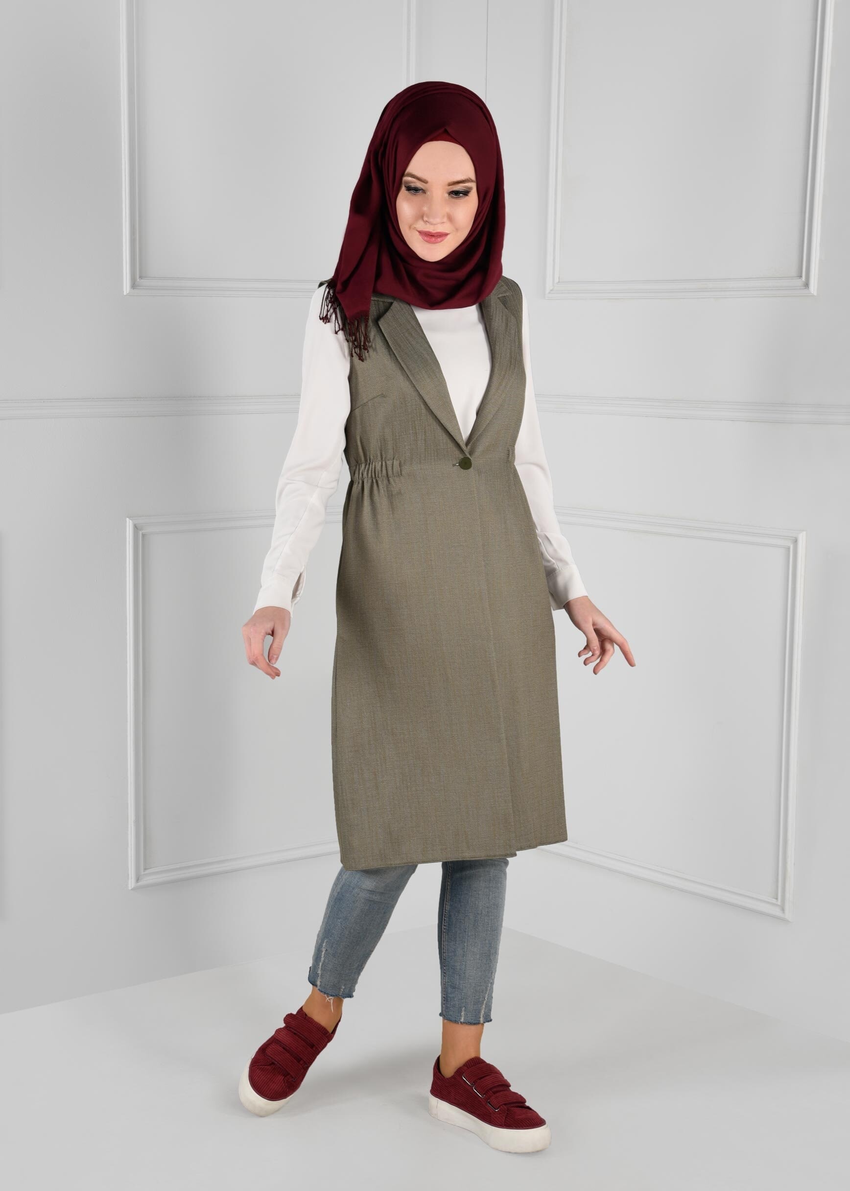 Tesettür giyim HAKİ BELİ LASTİKLİ SIRTI NAKIŞ İŞLEMELİ DÜĞMELİ YELEK 4749