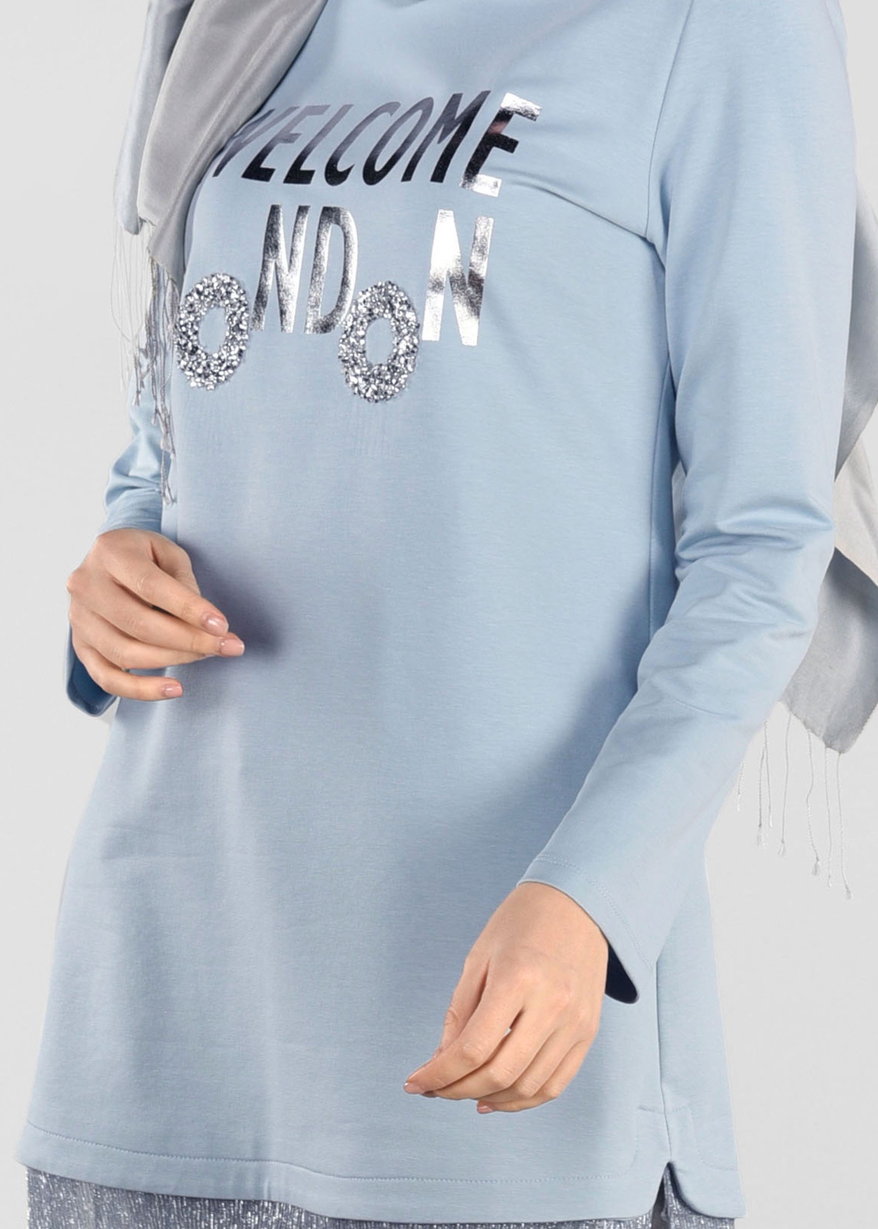 Tesettür giyim MAVİ ETEK UCU PARILTILI EŞOFMAN TUNİK 4875