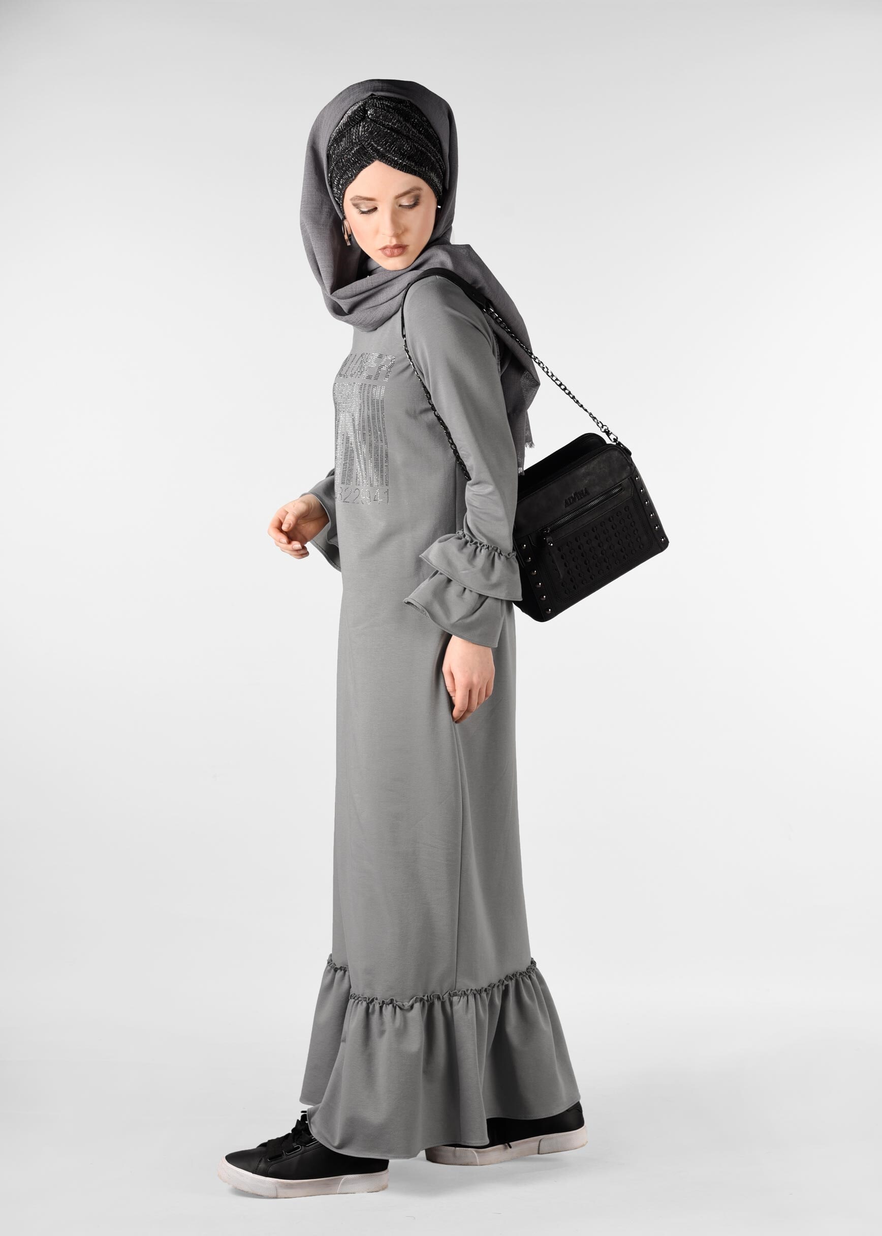 Tesettür giyim GRİ ETEK UCU VE KOLLARI VOLANLI EŞOFMAN ELBİSE 4882