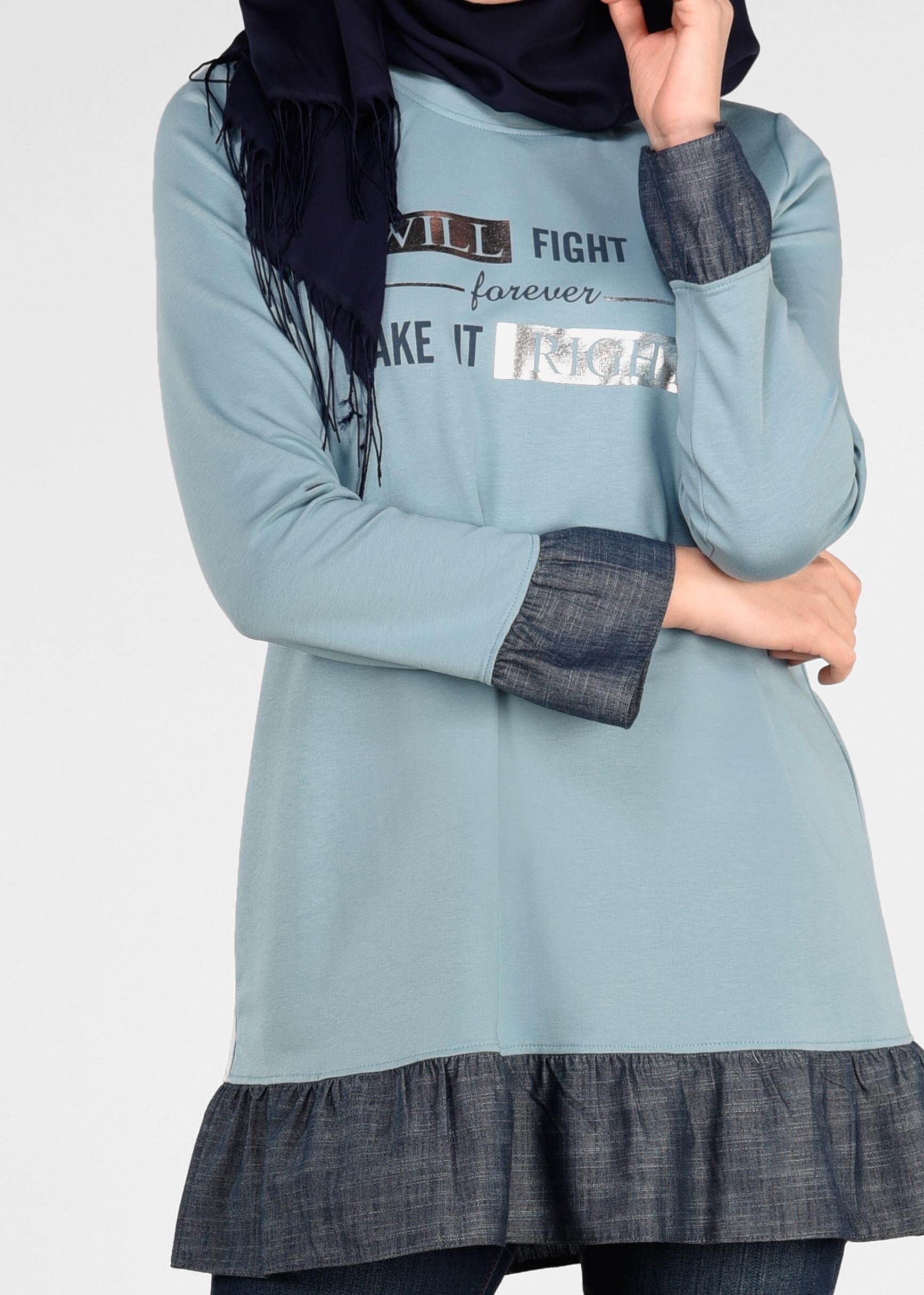 Tesettür giyim MAVİ ETEK UCU VE BİLEKLERİ FIRFIRLI EŞOFMAN TUNİK 4915