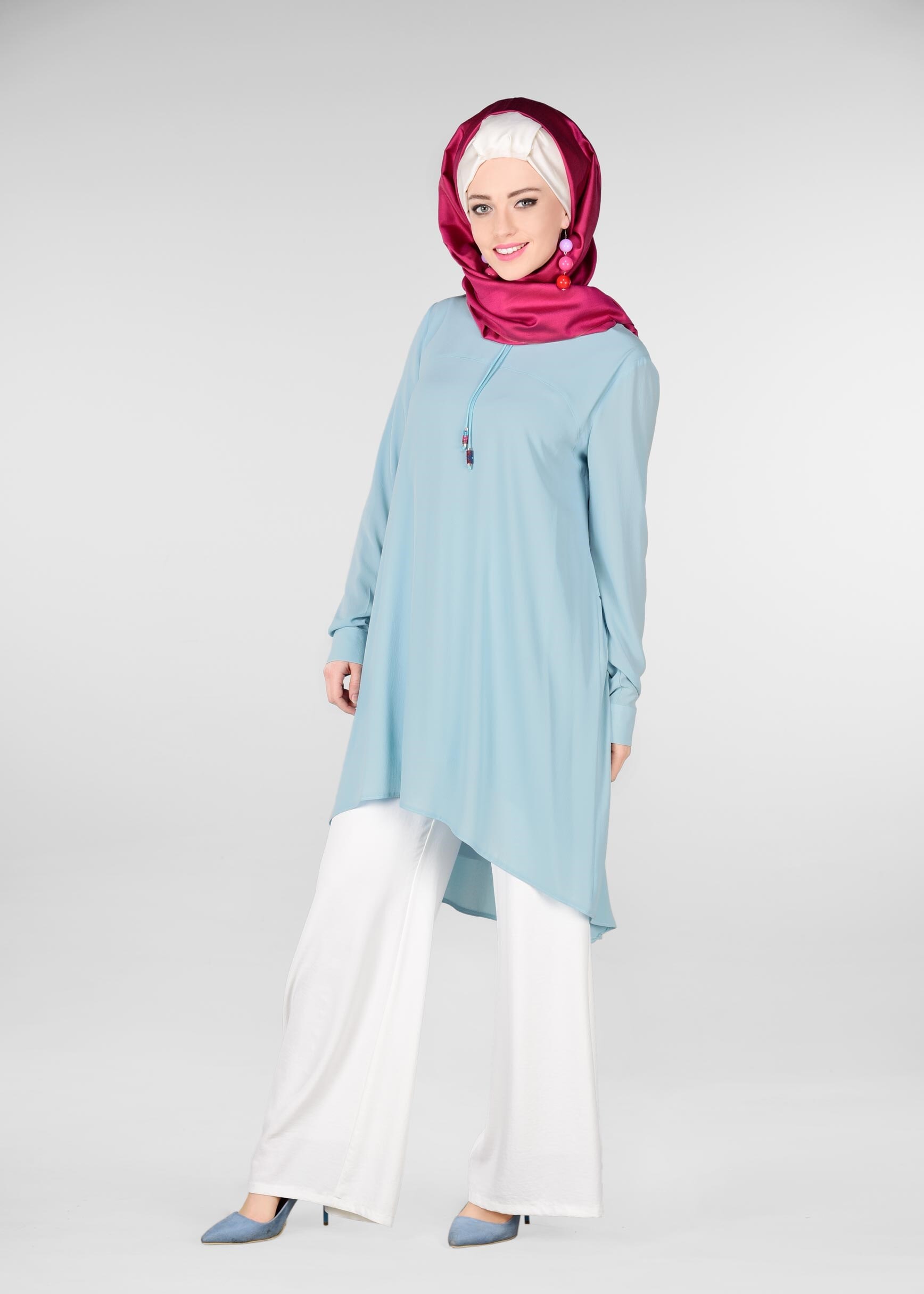 Tesettür giyim MAVİ SIRT KISMI ÇİÇEK BASKILI TUNİK 4996