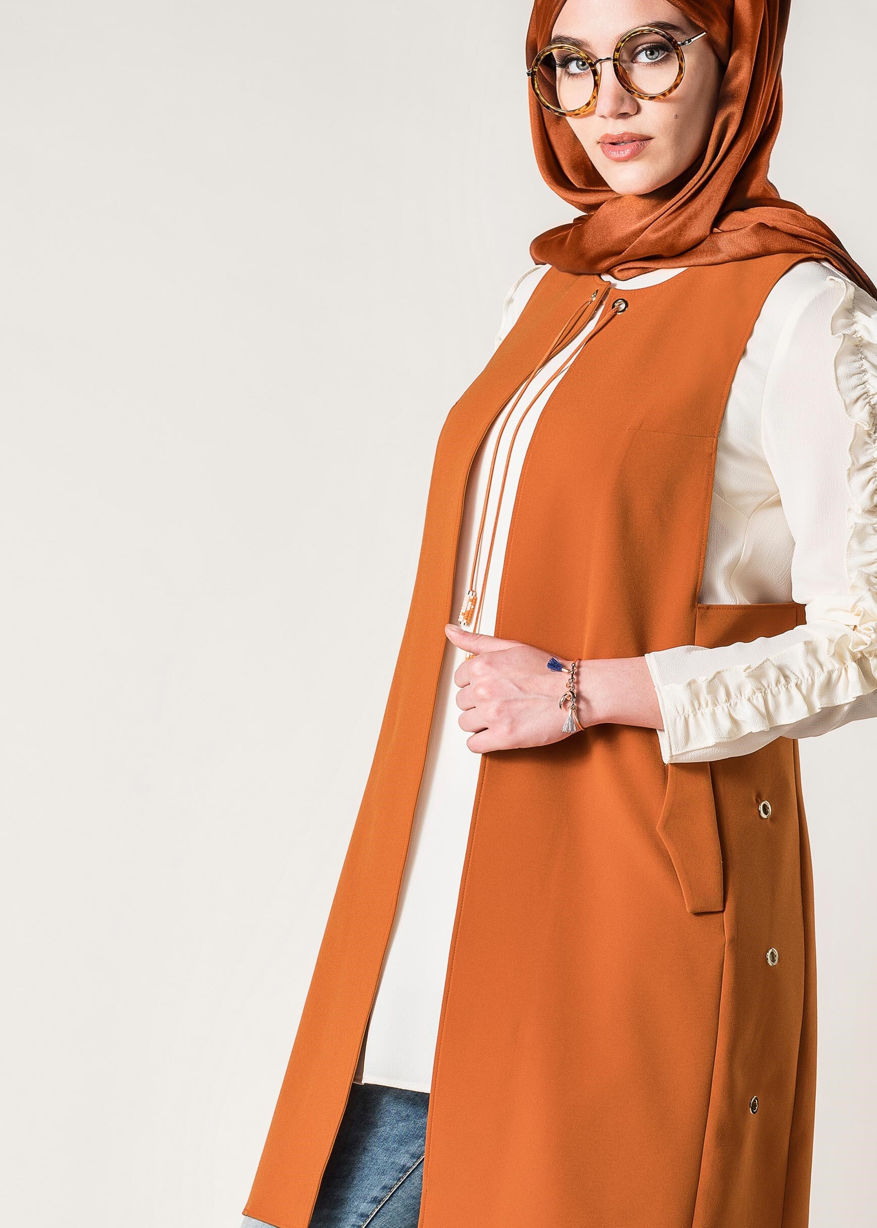 Tesettür giyim TURUNCU KUŞGÖZÜ DETAYLI YELEK 4048