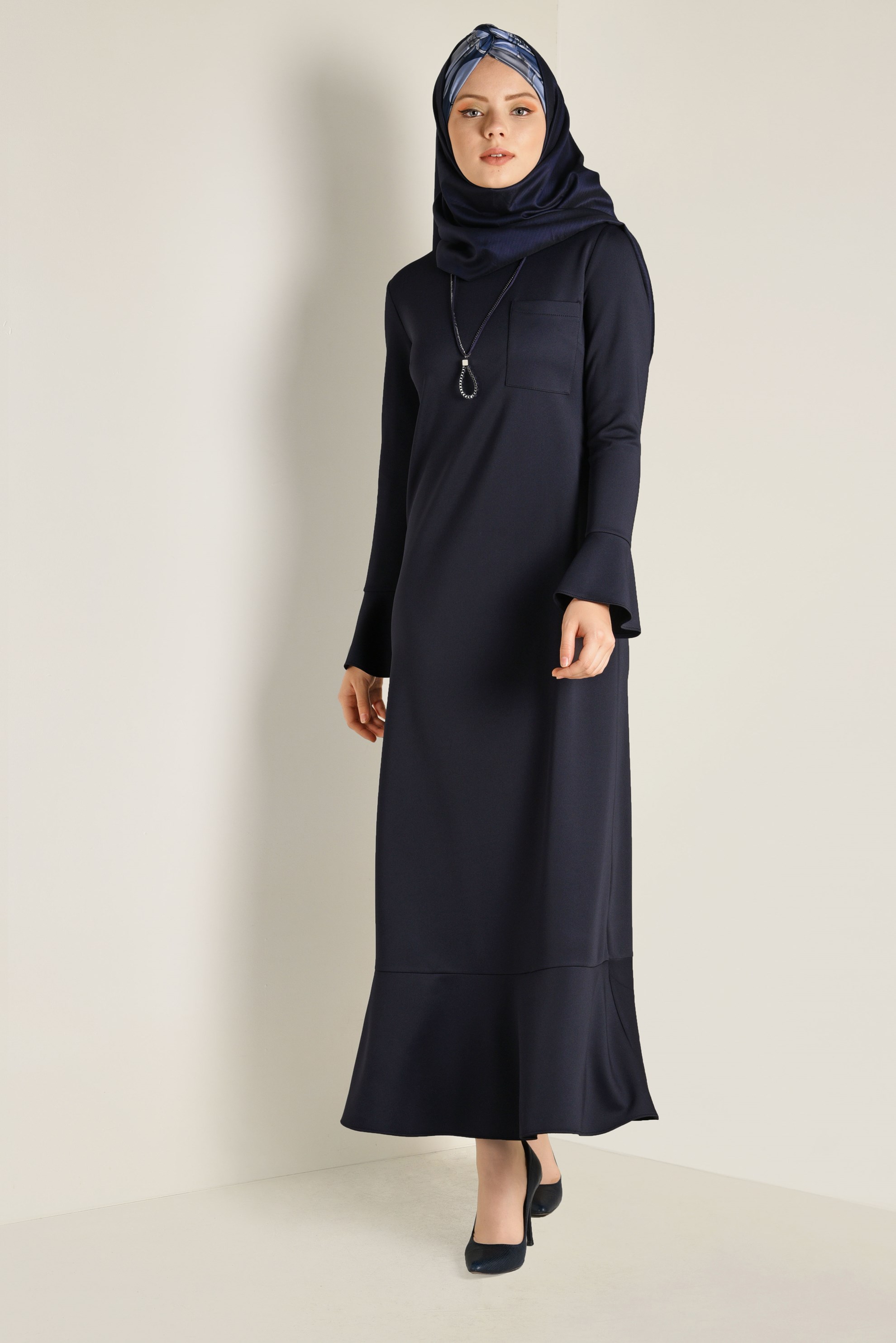 Tesettür giyim LACİVERT KOLLARI VE ETEK UCU VOLANLI ELBİSE 4805