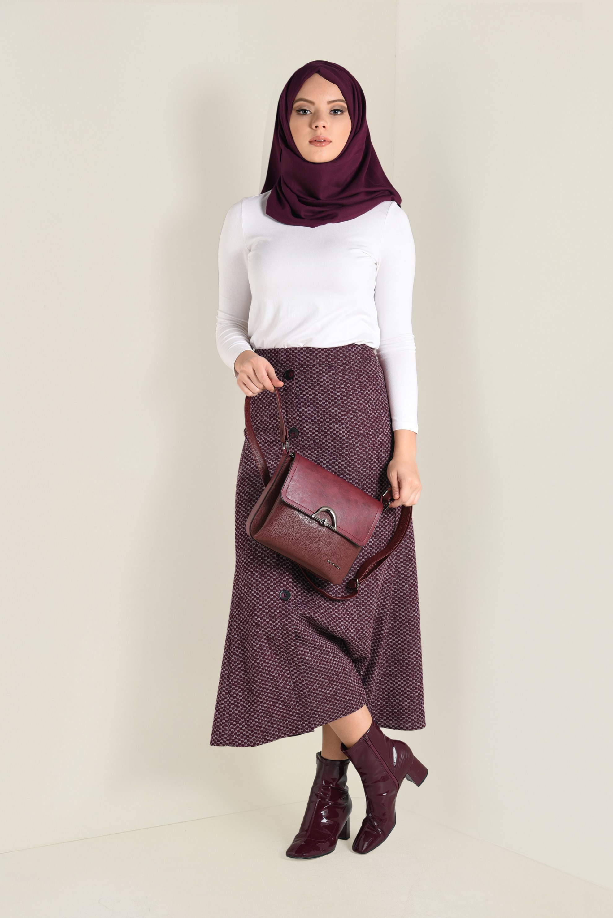 Tesettür giyim BORDO ÖNDEN DÜĞMELİ VOLANLI ETEK 6276