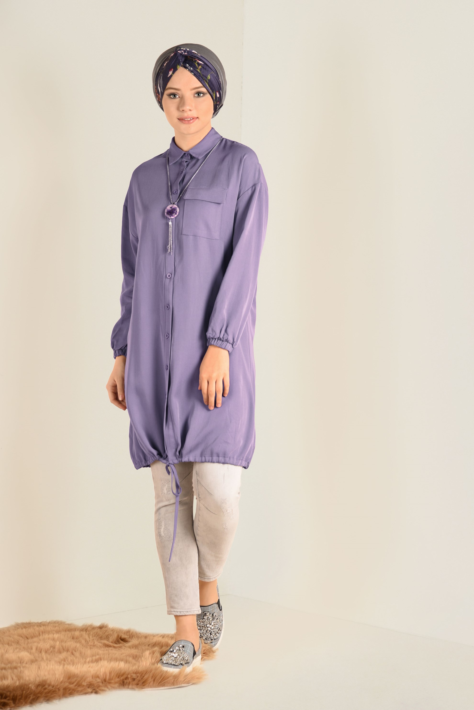 Tesettür giyim MOR ETEK UCU BÜZGÜLÜ BİLEKLERİ LASTİKLİ TUNİK 4704 