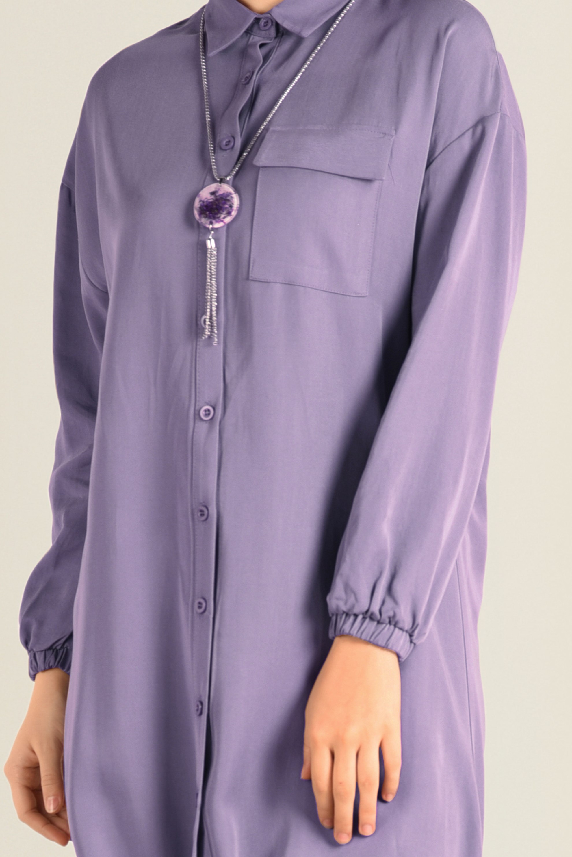 Tesettür giyim MOR ETEK UCU BÜZGÜLÜ BİLEKLERİ LASTİKLİ TUNİK 4704 