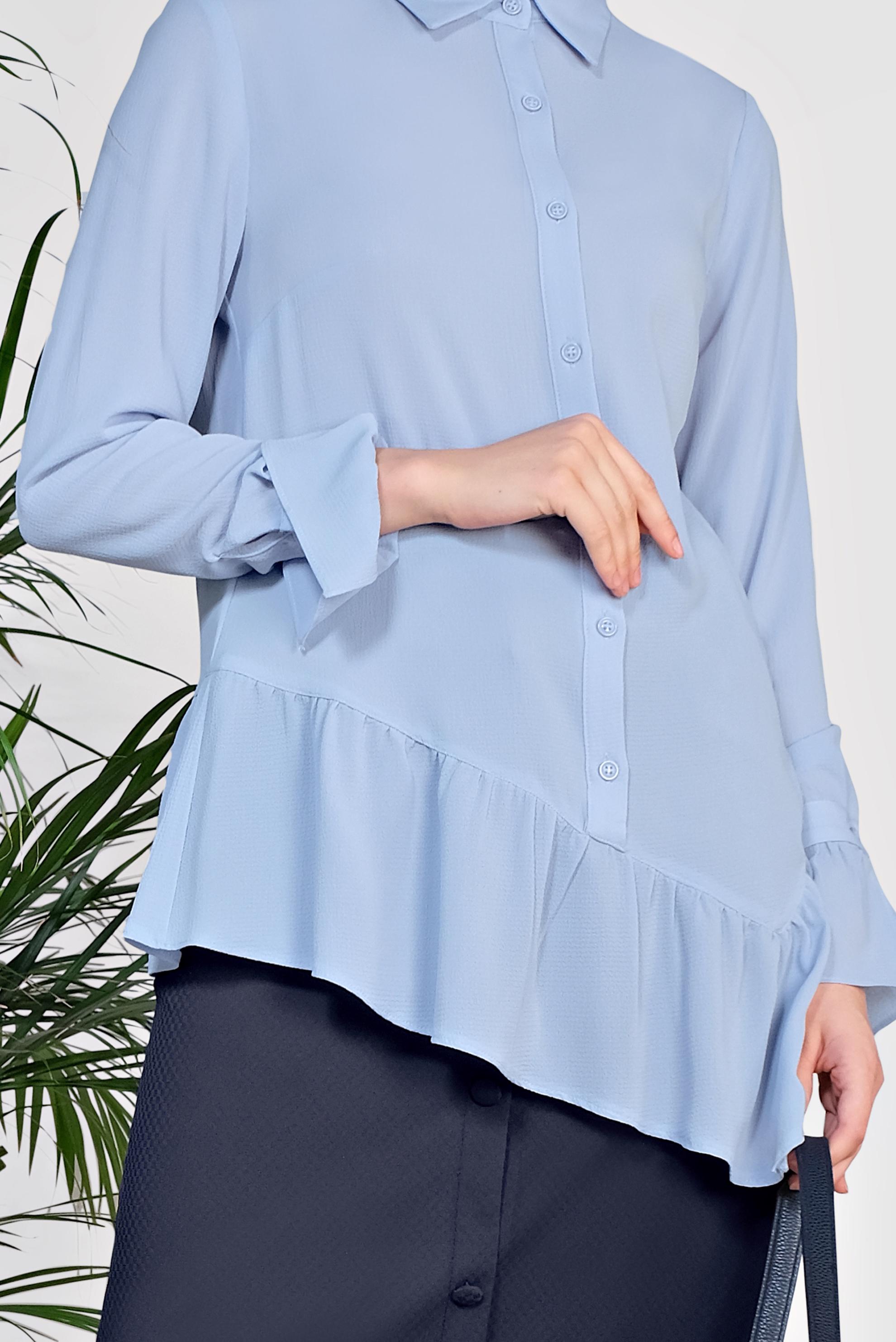 Tesettür giyim MAVİ ETEK UCU VE KOLLARI VOLANLI ASİMETRİK KESİM BLUZ 4234