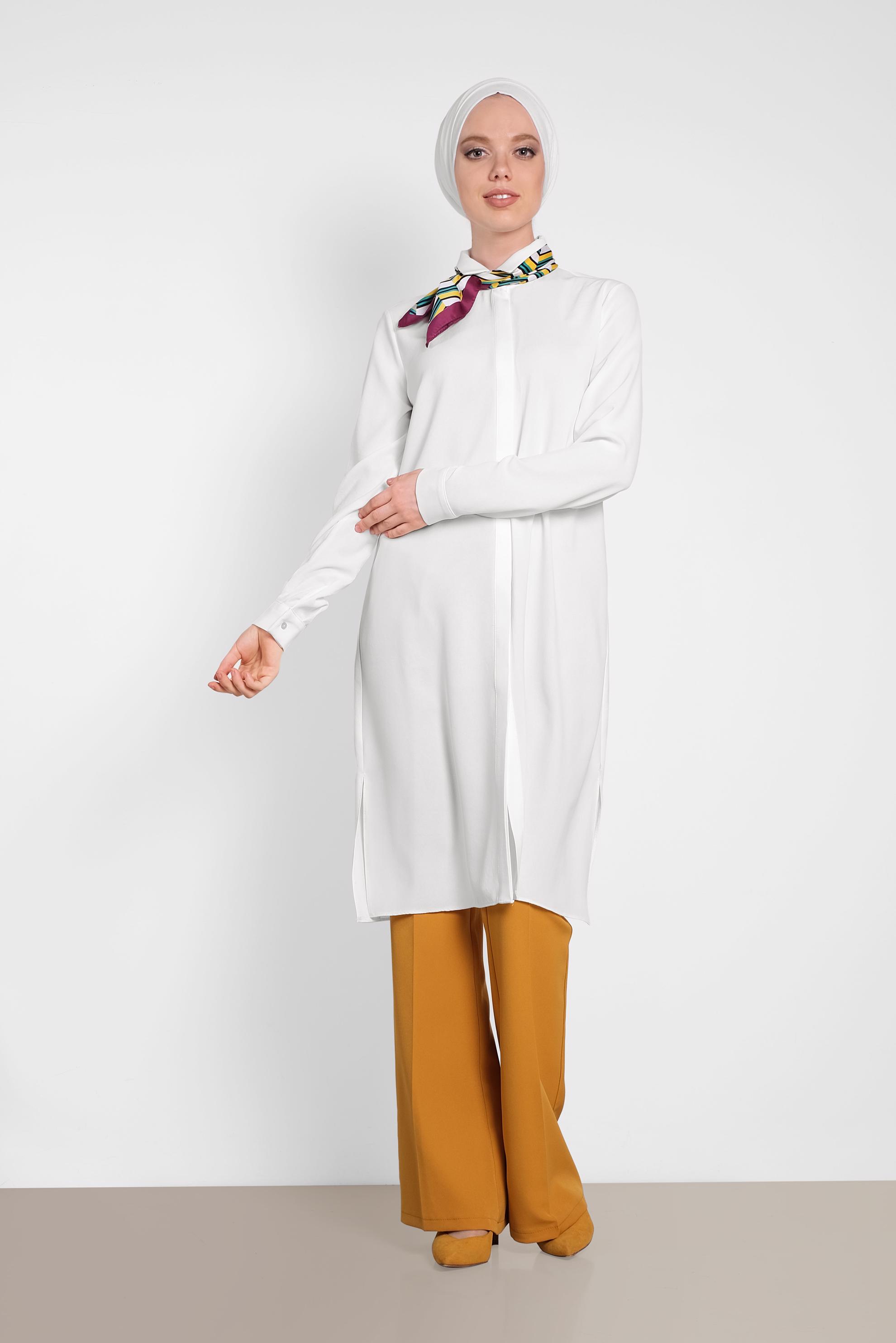 Tesettür giyim BEYAZ SIRT KISMI PÜSKÜL VE NAKIŞ DETAYLI TUNİK 4382 