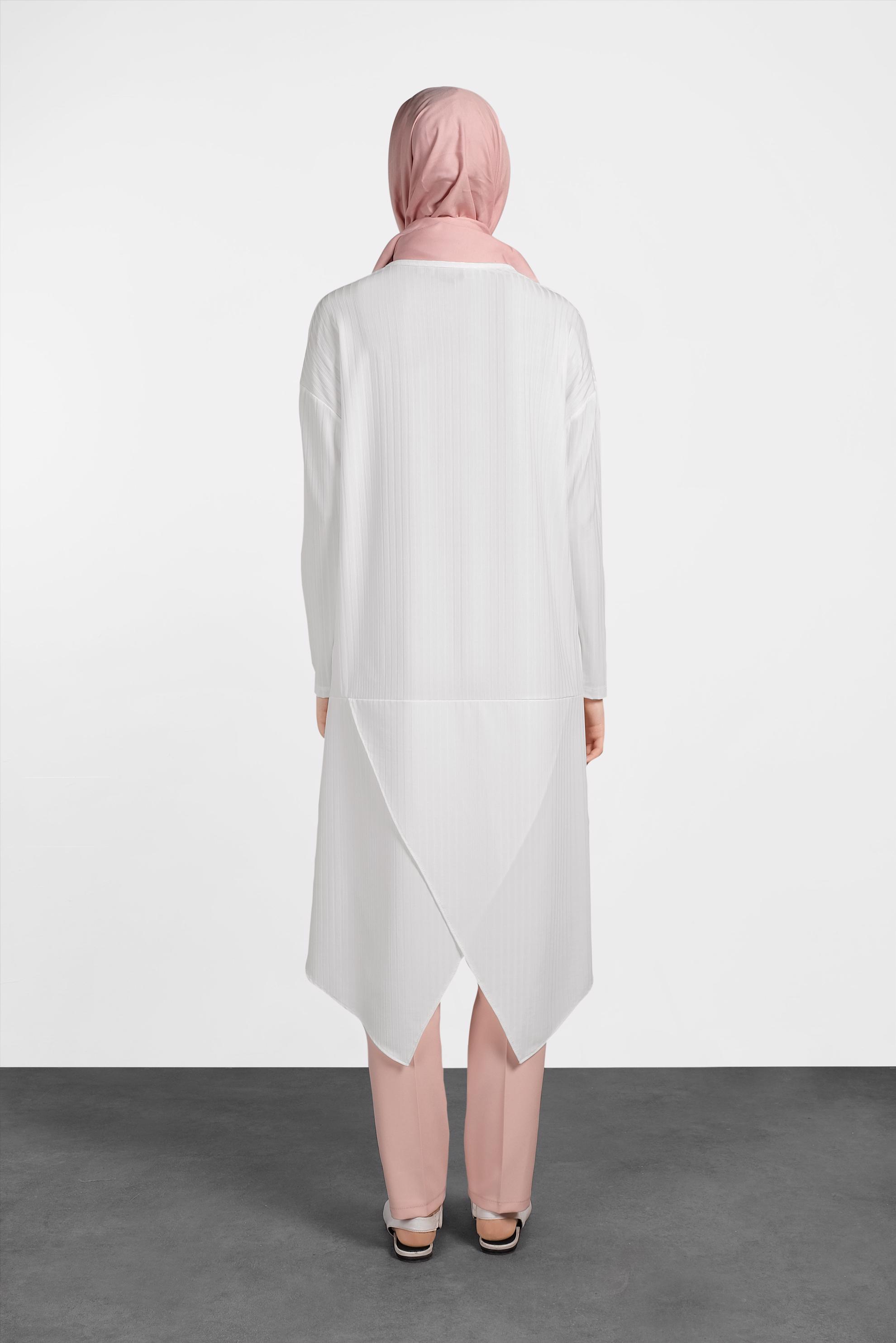 Tesettür giyim BEYAZ CEP DETAYLI ASİMETRİK KESİM TUNİK 4448