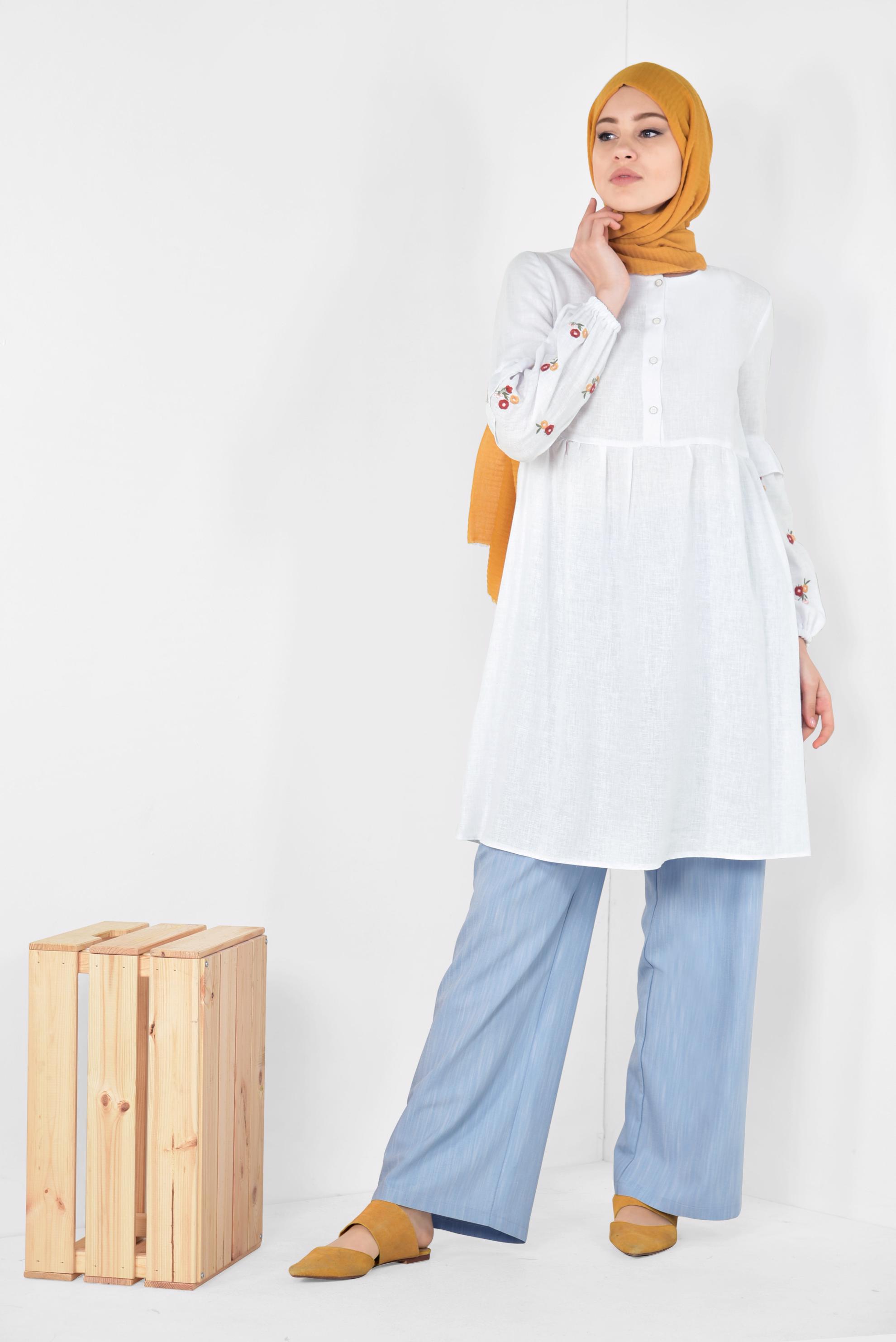 Tesettür giyim BEYAZ NAKIŞ İŞLEMELİ VOLANLI TUNİK 4986