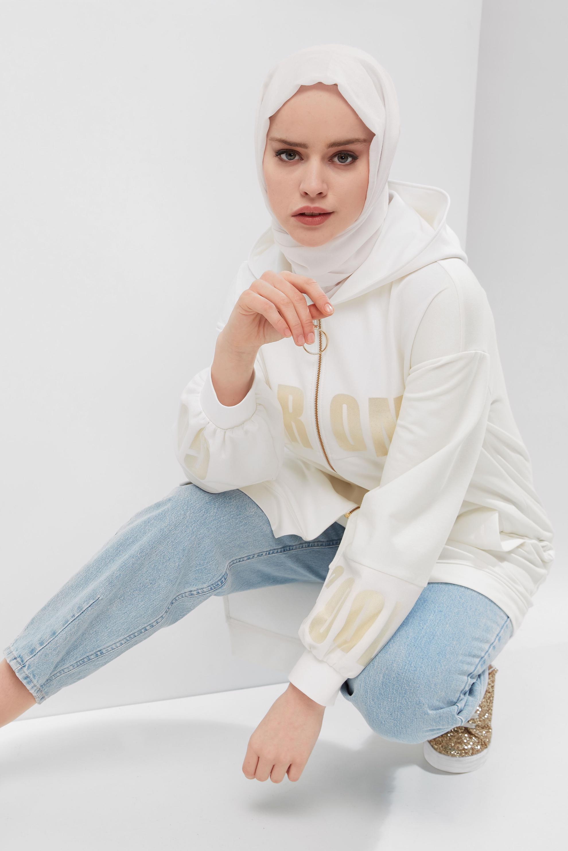 Tesettür giyim BEYAZ ASİMETRİK KESİM BASKILI EŞOFMAN TUNİK 40607 