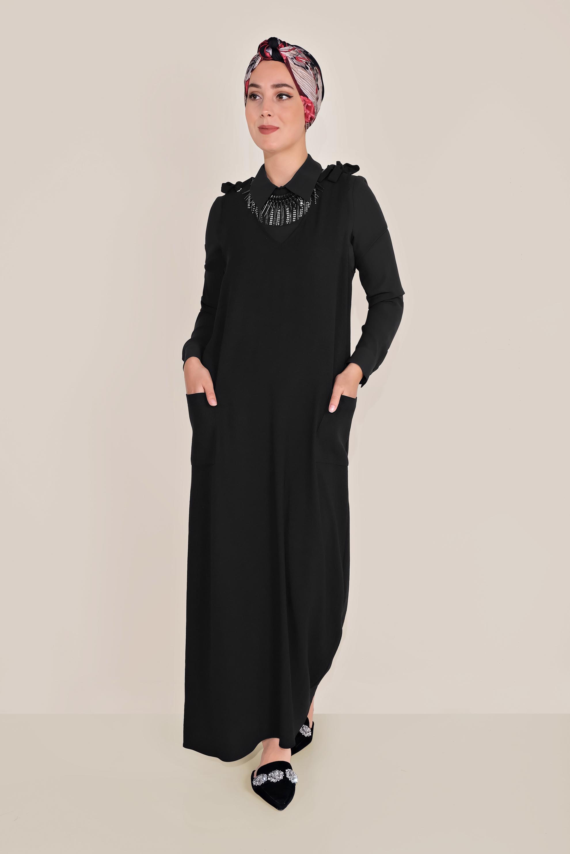 Tesettür giyim SİYAH OMUZDAN BAĞLAMALI CEPLİ JİLE 40758 