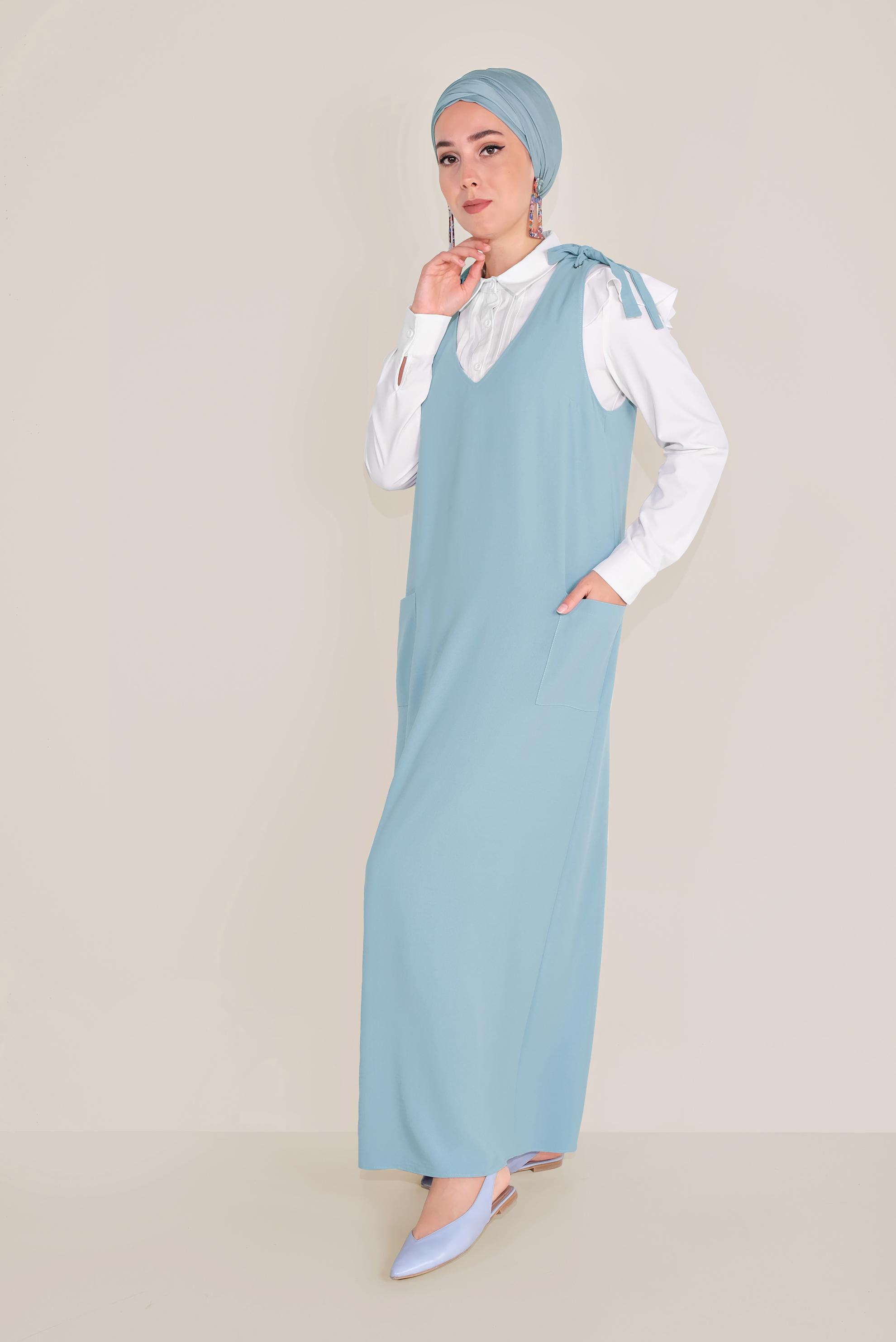 Tesettür giyim MAVİ OMUZDAN BAĞLAMALI CEPLİ JİLE 40758 