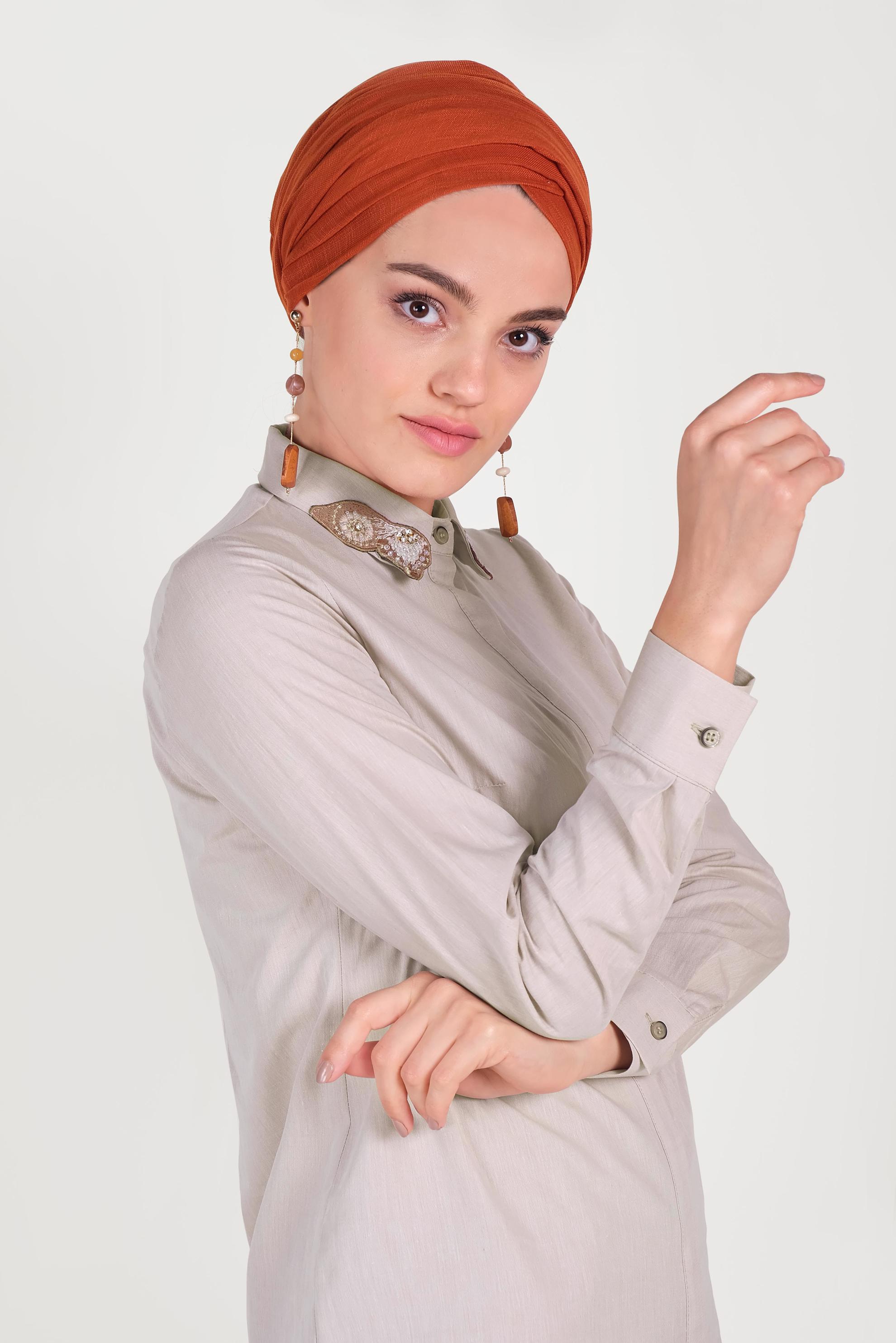 Tesettür giyim BEJ YAKASI NAKIŞLI TUNİK 40452