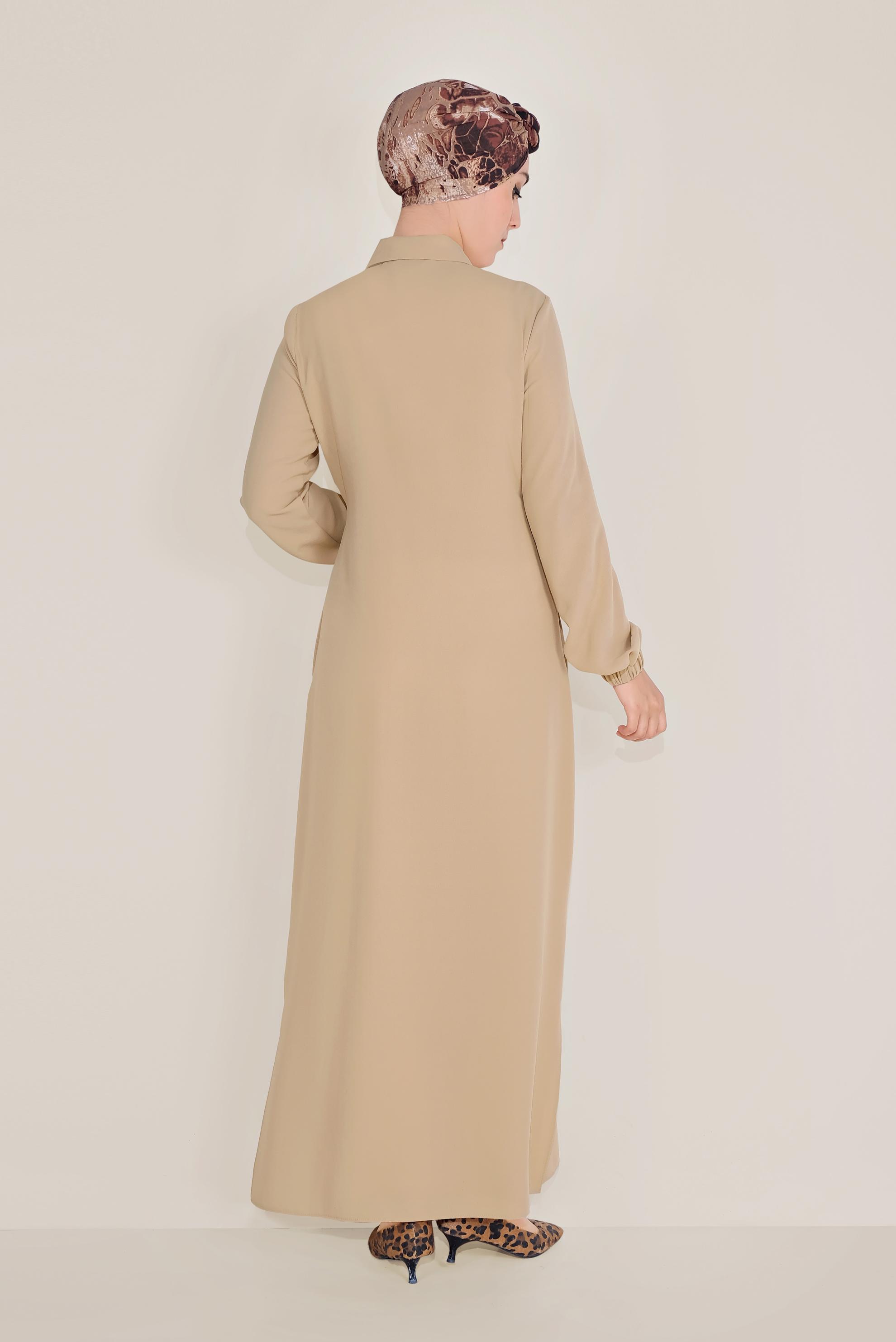 Tesettür giyim BEJ BEL KISMI BÜZGÜLÜ BAĞCIKLI TUNİK 40706