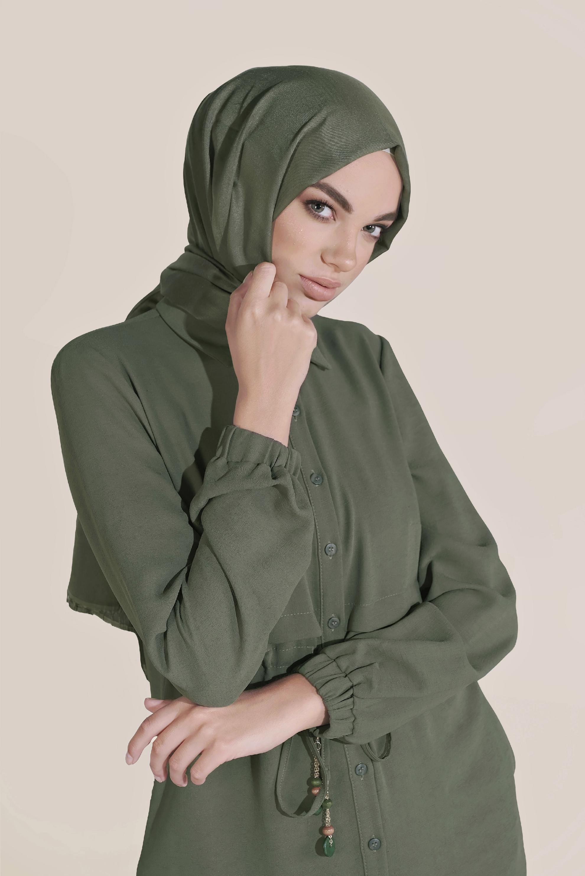 Tesettür giyim HAKİ BEL KISMI BÜZGÜLÜ BAĞCIKLI TUNİK 40706