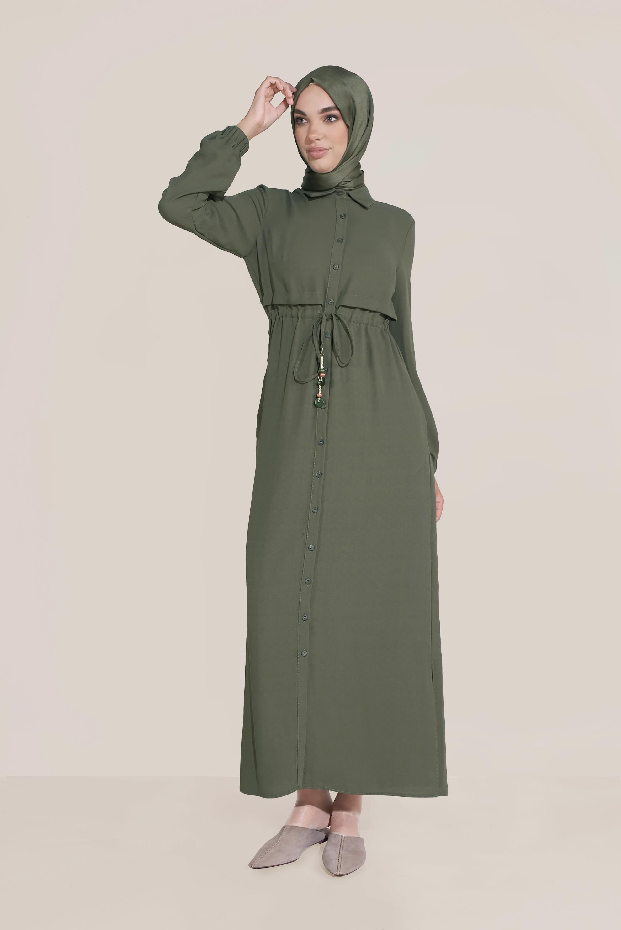 Tesettür giyim HAKİ BEL KISMI BÜZGÜLÜ BAĞCIKLI TUNİK 40706