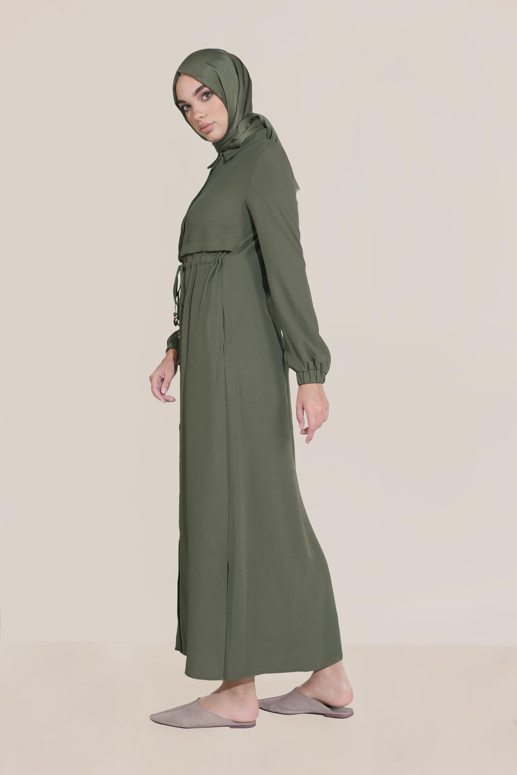 Tesettür giyim HAKİ BEL KISMI BÜZGÜLÜ BAĞCIKLI TUNİK 40706