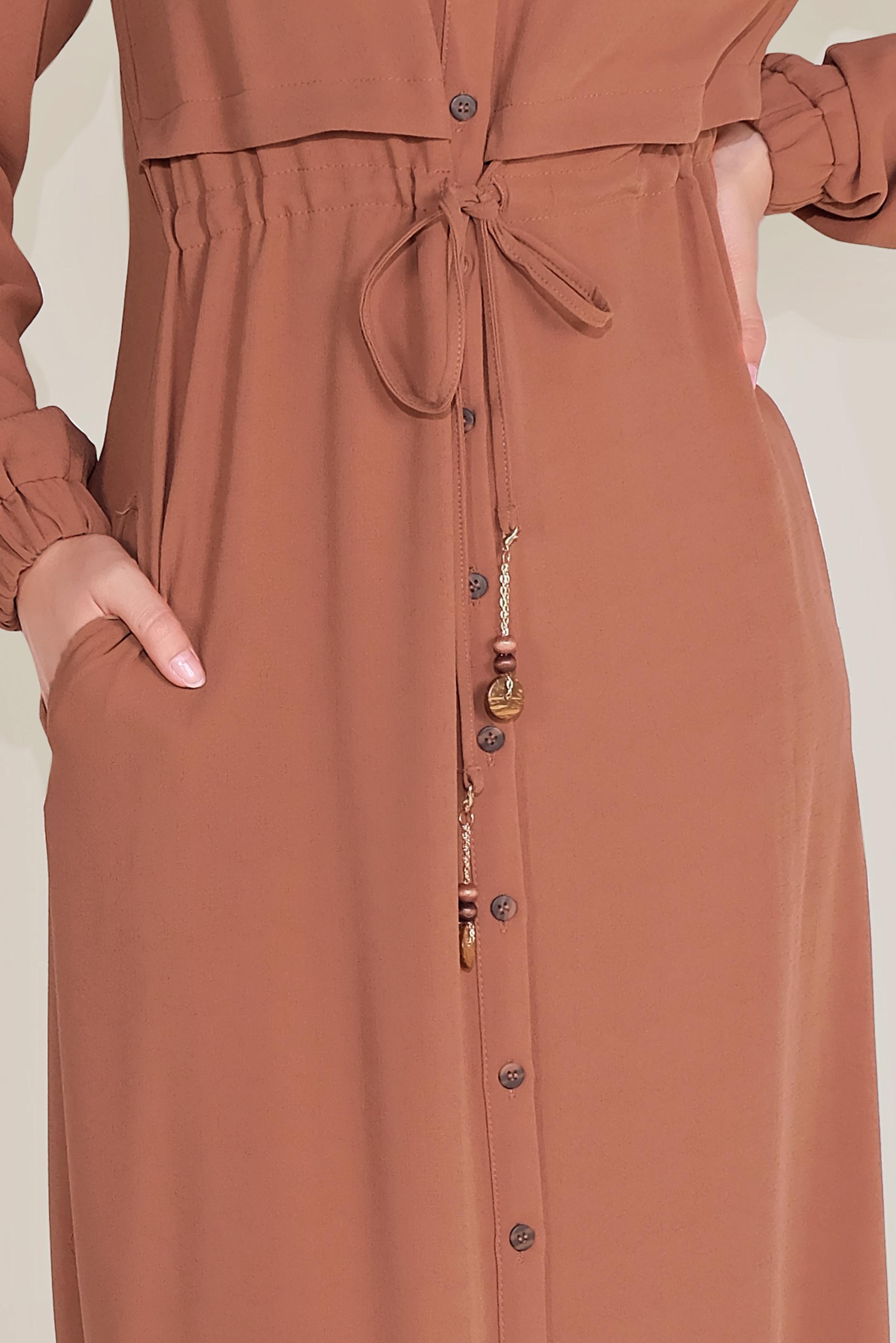 Tesettür giyim TURUNCU BEL KISMI BÜZGÜLÜ BAĞCIKLI TUNİK 40706