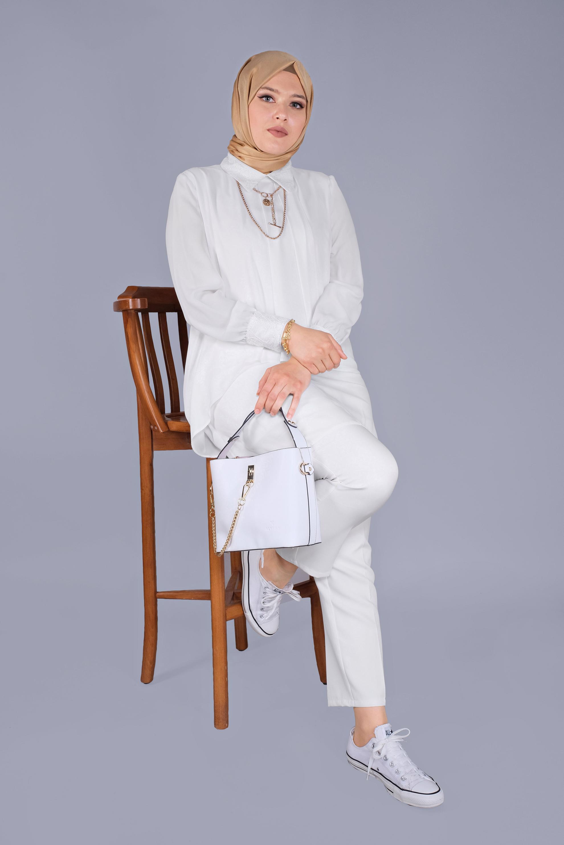 Tesettür giyim BEYAZ NAKIŞ DETAYLI VOLANLI TUNİK 20054