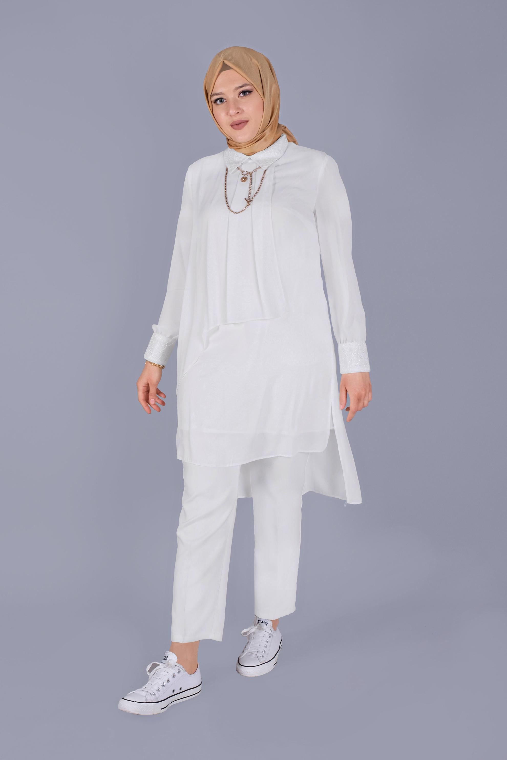 Tesettür giyim BEYAZ NAKIŞ DETAYLI VOLANLI TUNİK 20054