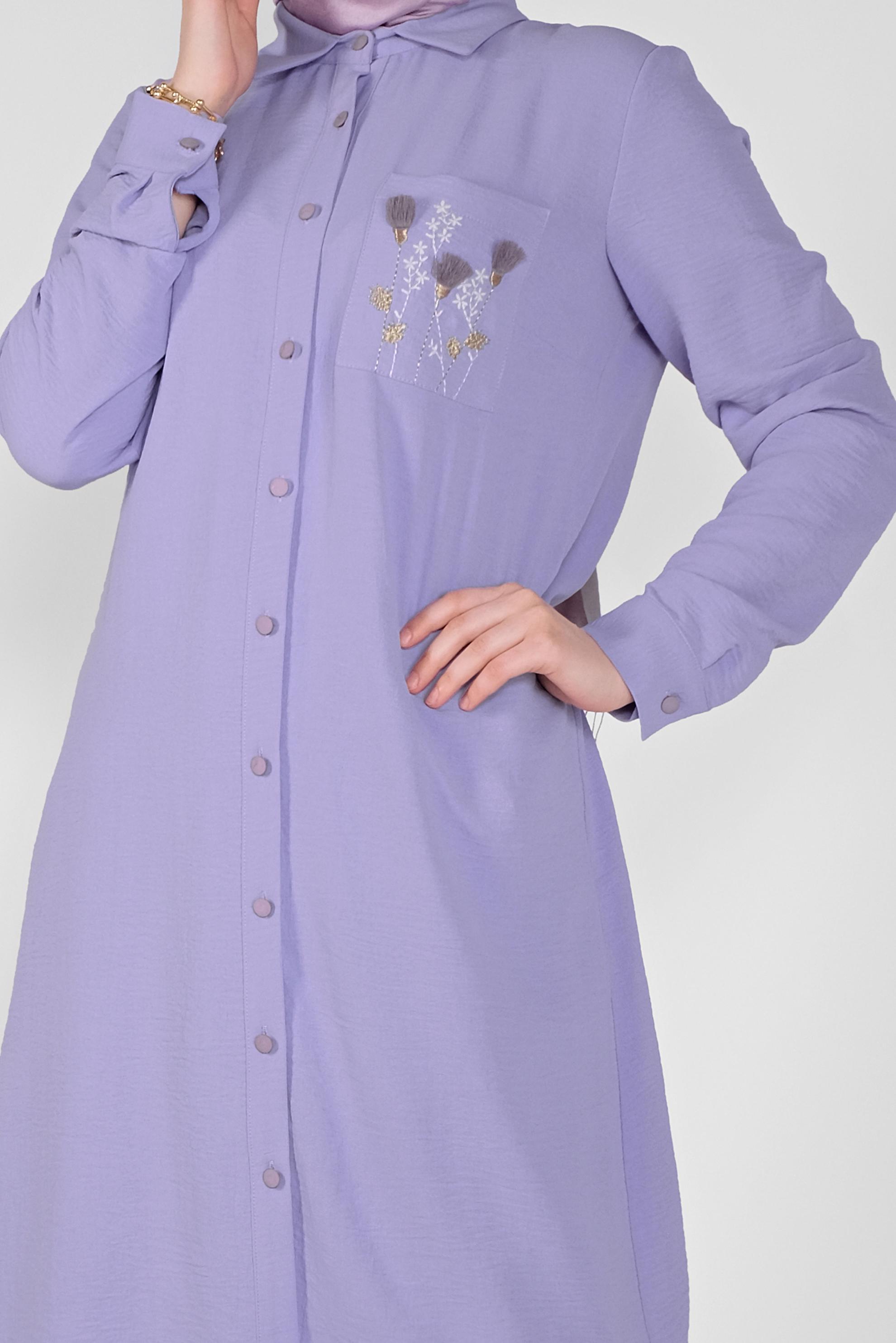 Tesettür giyim MOR CEP KISMI NAKIŞ İŞLEMELİ TUNİK 40664