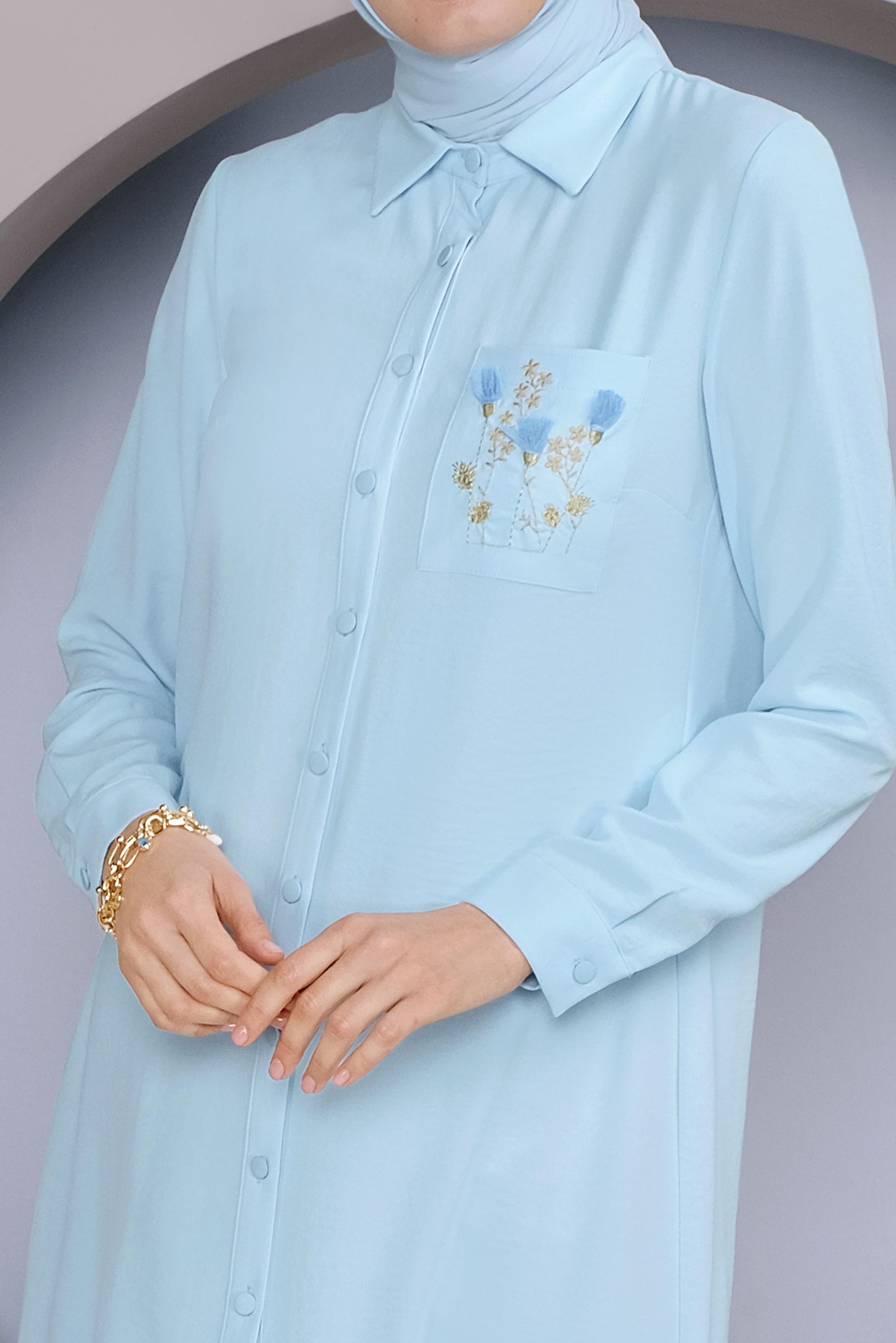 Tesettür giyim MAVİ CEP KISMI NAKIŞ İŞLEMELİ TUNİK 40664