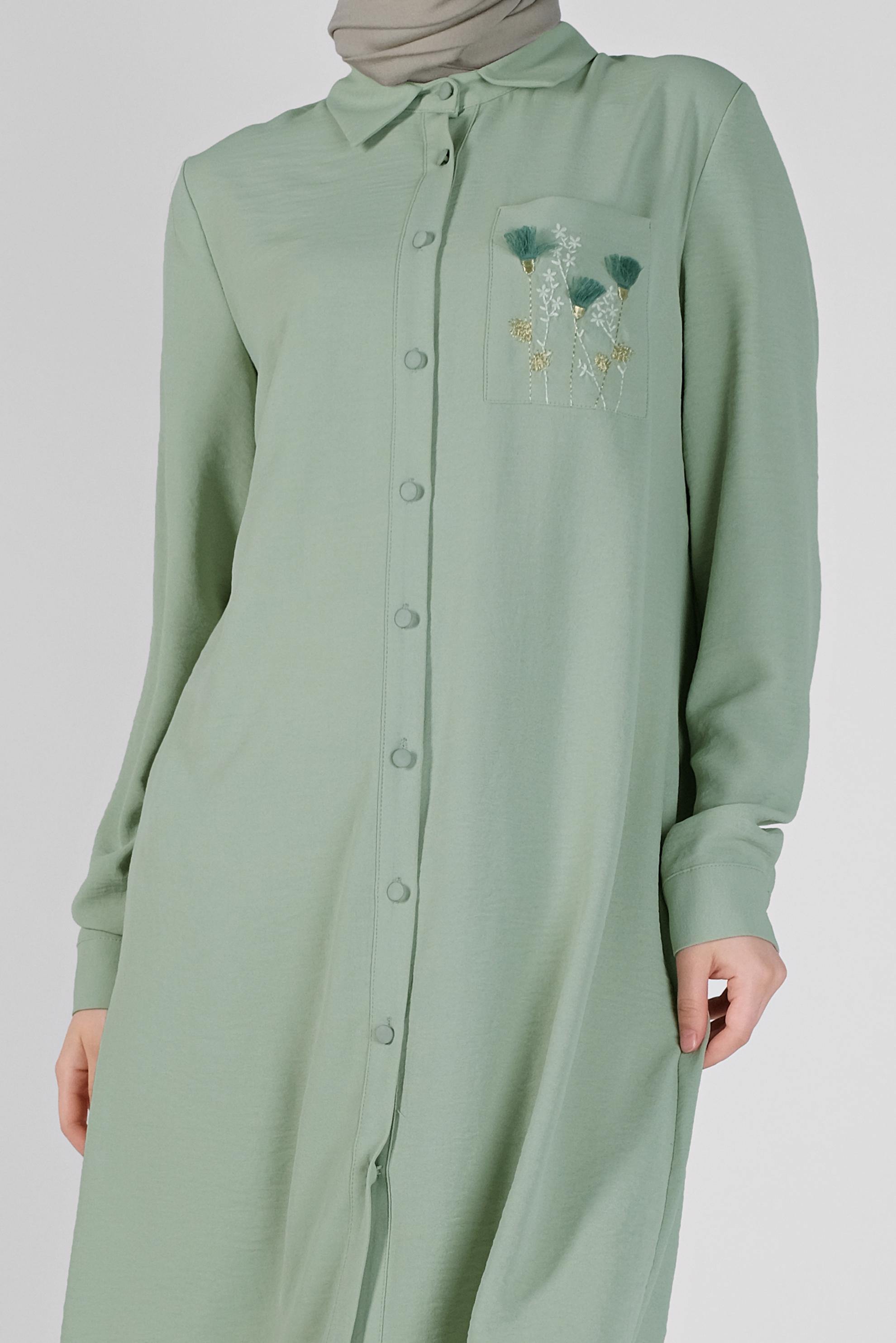 Tesettür giyim YEŞİL CEP KISMI NAKIŞ İŞLEMELİ TUNİK 40664