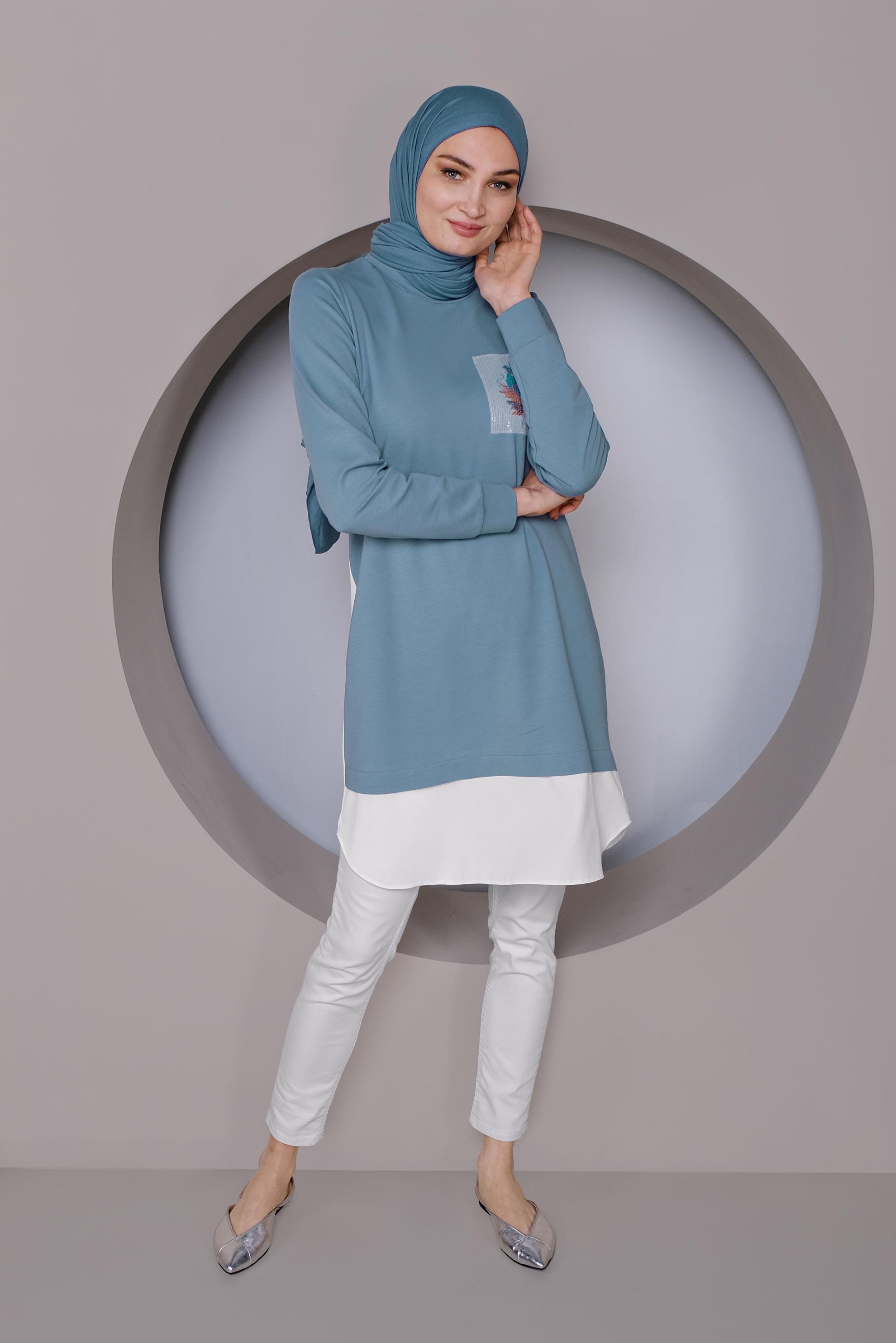 Tesettür giyim MAVİ PARÇA DETAYLI SIRT KISMI DÜĞMELİ TUNİK 41369