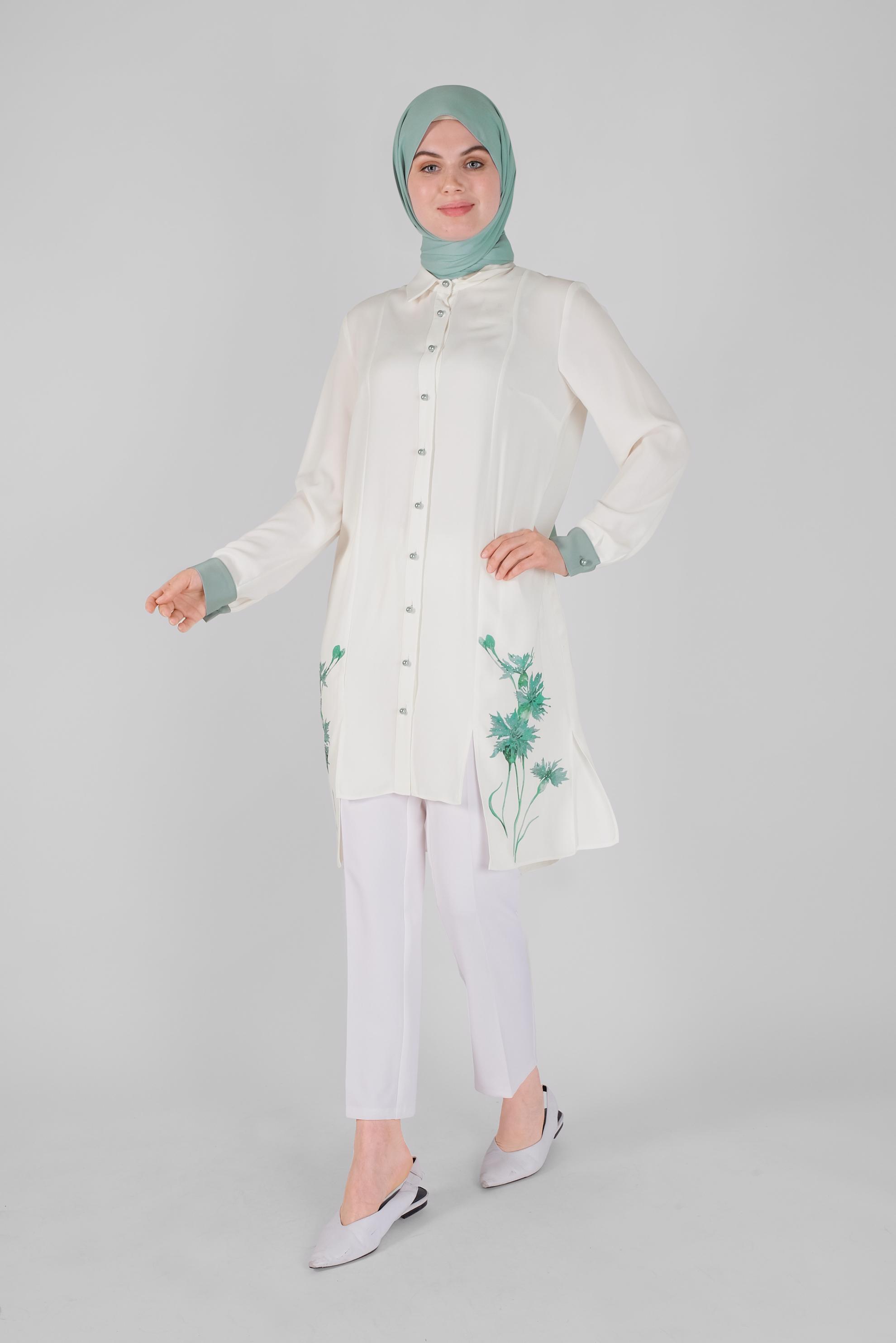 Tesettür giyim BEYAZ ÇİÇEK BASKILI ASİMETRİK KESİM TUNİK 41421