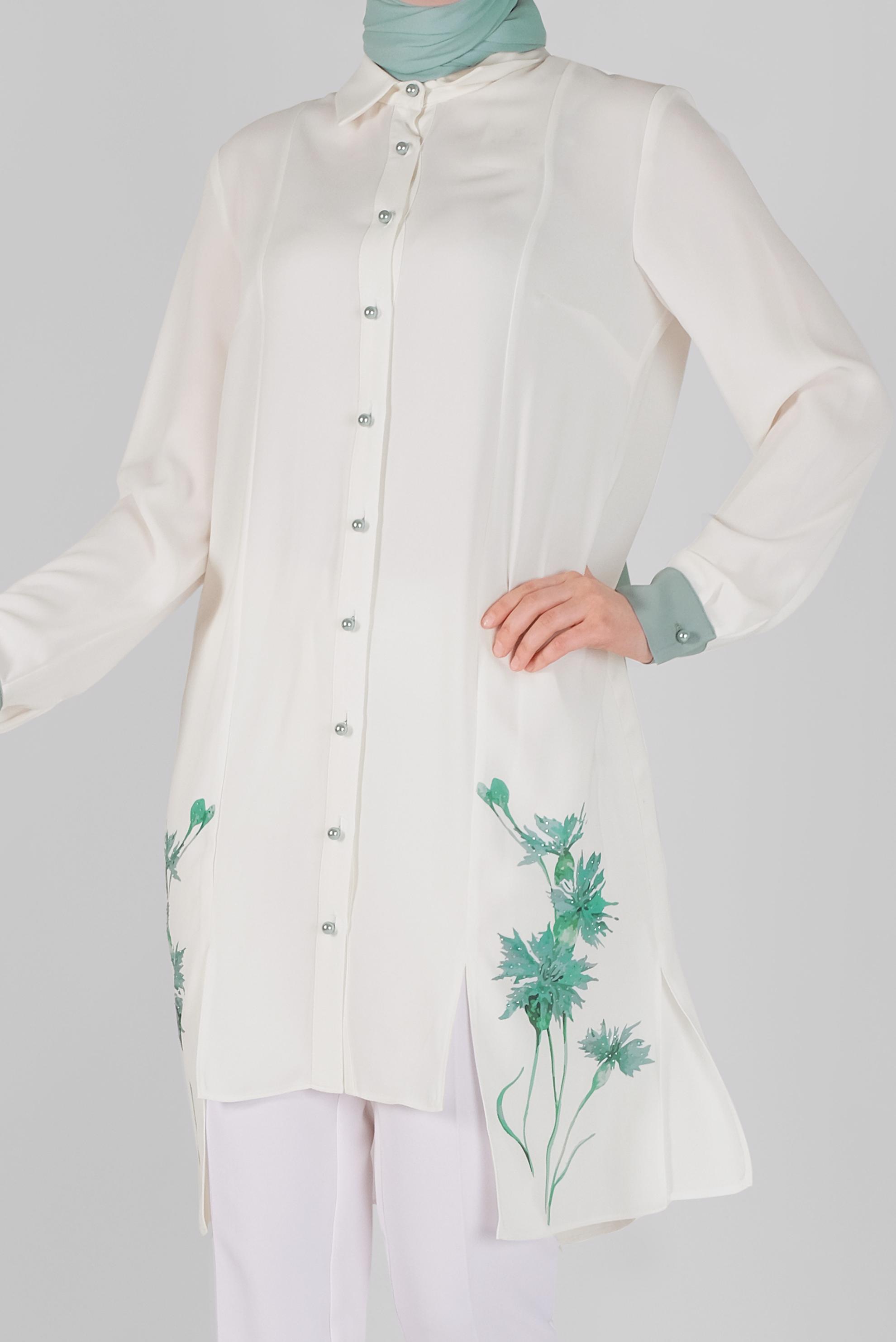 Tesettür giyim BEYAZ ÇİÇEK BASKILI ASİMETRİK KESİM TUNİK 41421