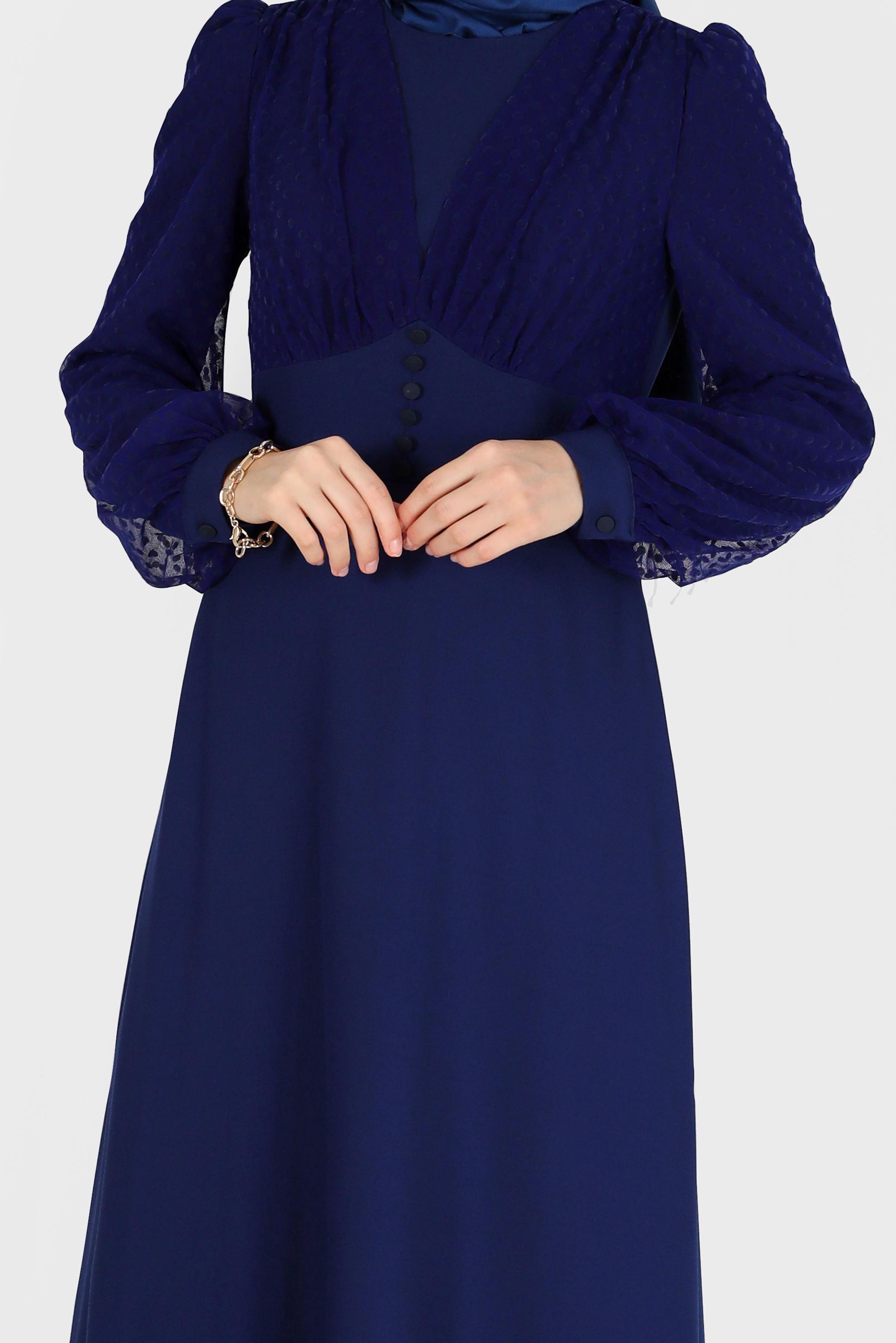 Tesettür giyim LACİVERT KOLLARI PUANTİYELİ TÜL DETAYLI DÜĞMELİ ELBİSE 42334 