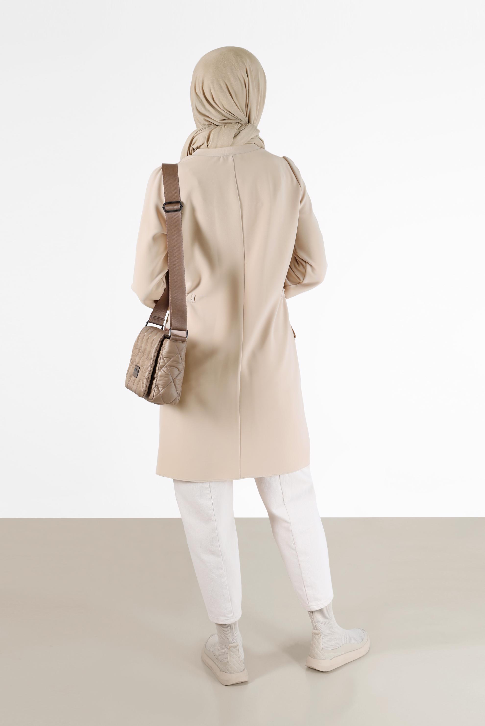 Tesettür giyim BEJ BELİ BÜZGÜ DETAYLI MANŞETLERİ LASTİKLİ TUNİK 42423 