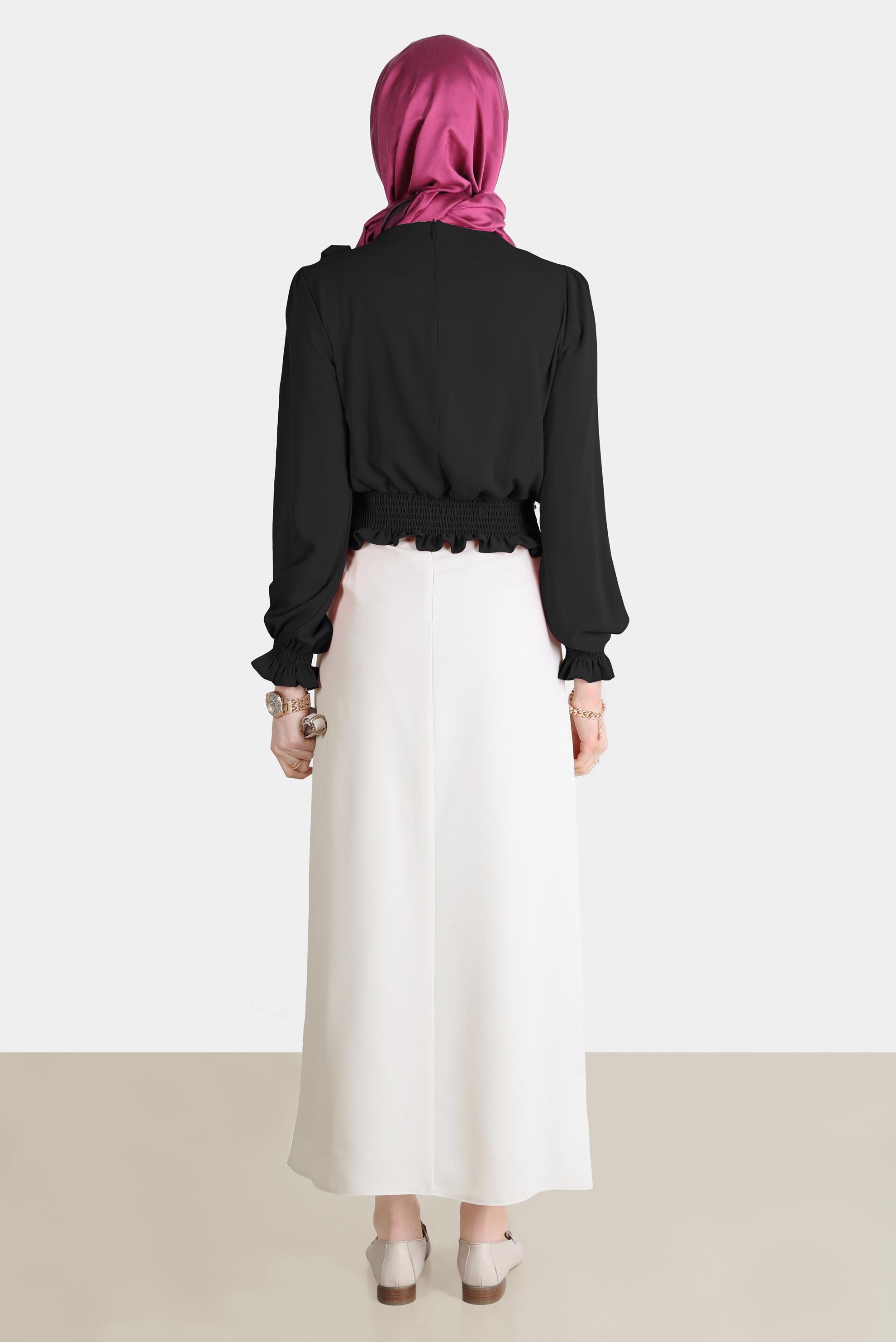 Tesettür giyim SİYAH BELİ LASTİKLİ FİYONK DETAYLI BLUZ 42755	