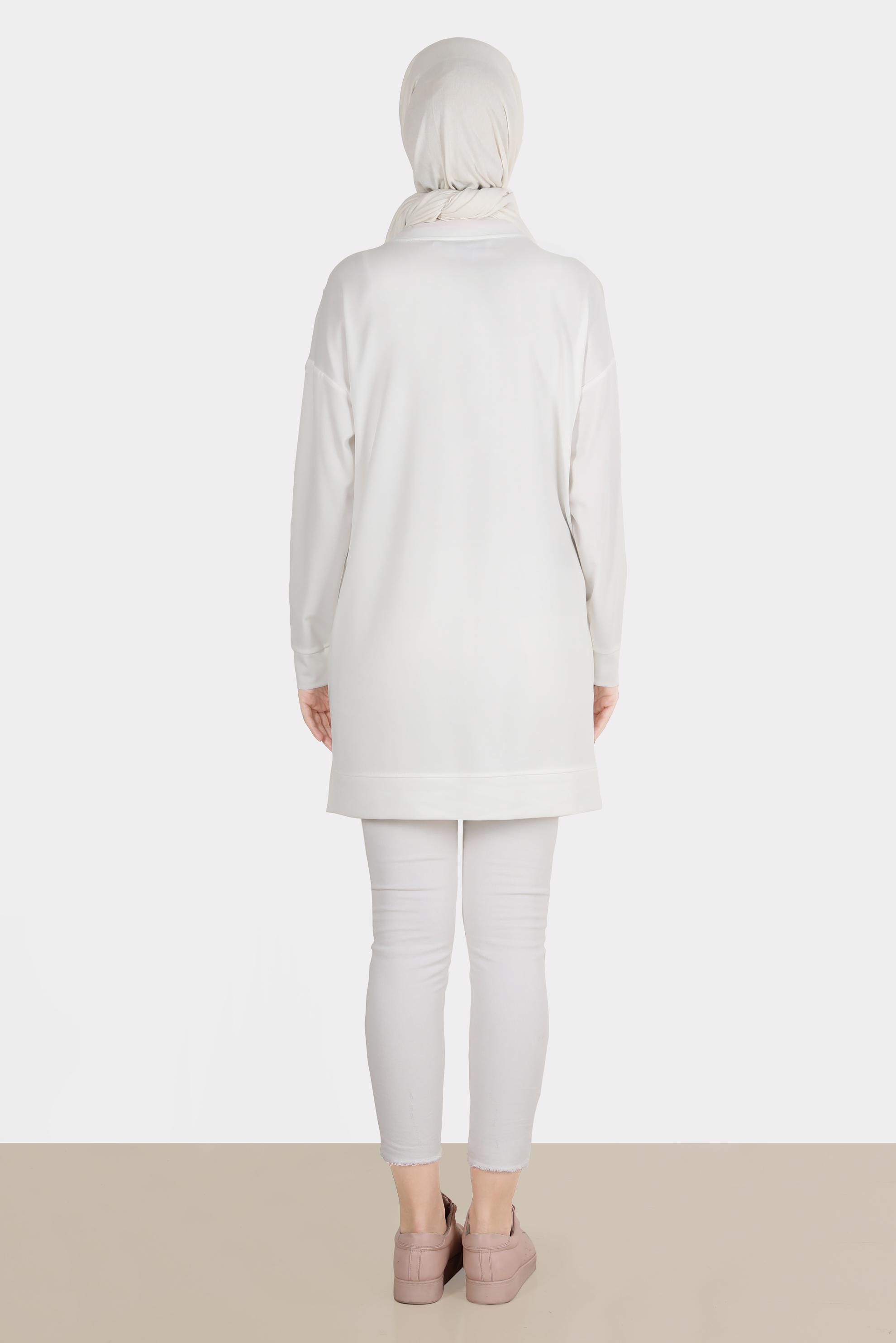 Tesettür giyim BEYAZ NAKIŞLI CEPLİ EŞOFMAN TUNİK 42858	