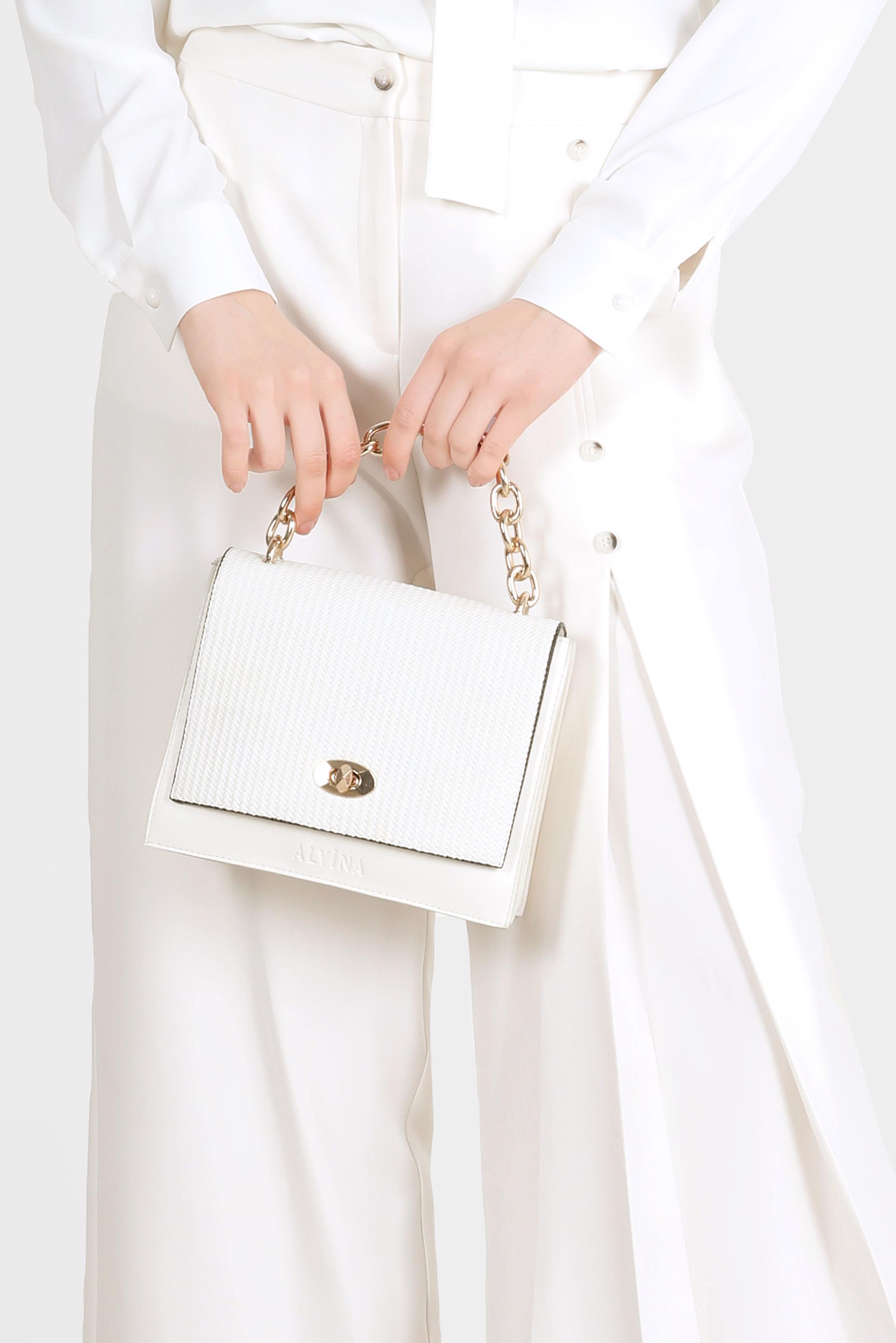 Tesettür giyim BEYAZ DÜĞMELİ PİLE DETAYLI BOL KESİM PANTOLON 70359 