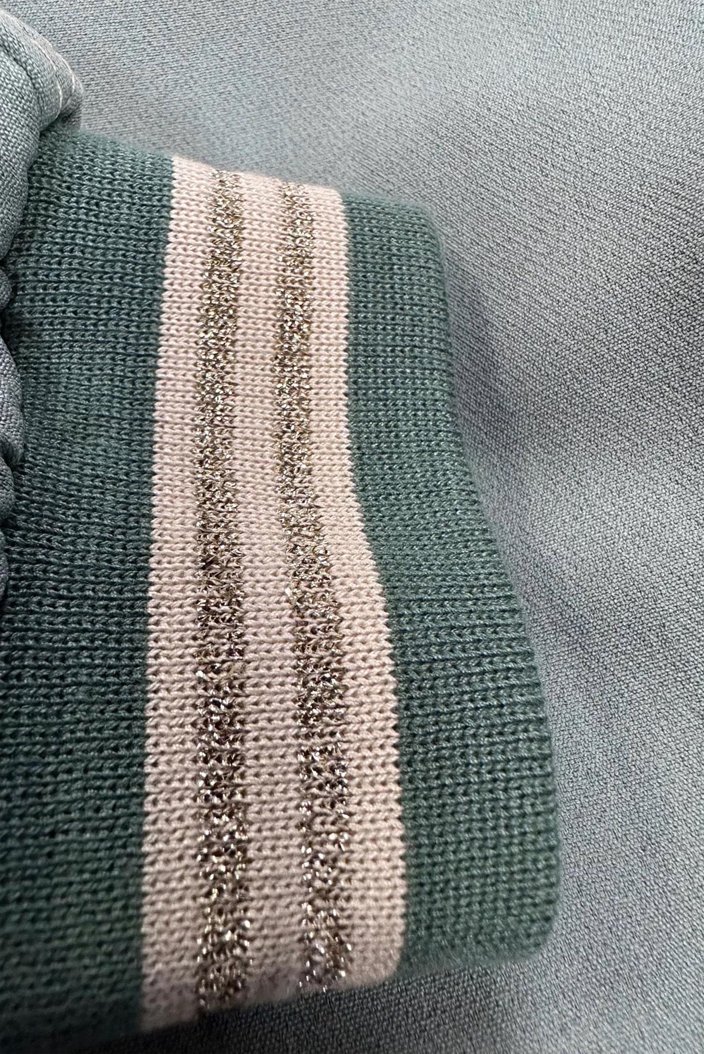 Tesettür giyim YEŞİL BELİ BÜZGÜLÜ MANŞETLERİ LASTİKLİ PARDESÜ 10553