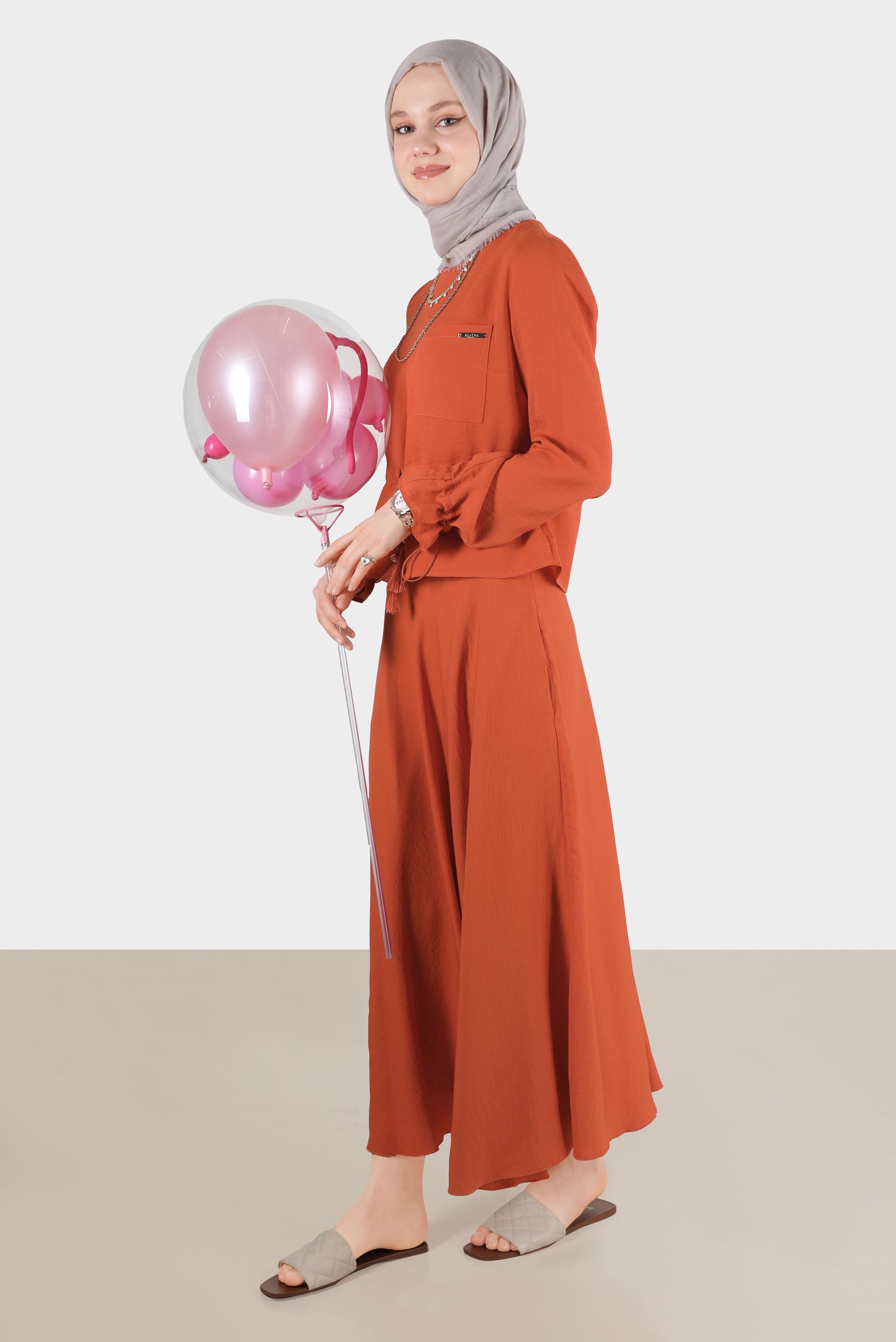 Tesettür giyim TURUNCU BELİ VE MANŞETLERİ BÜZGÜLÜ İKİLİ ETEKLİ TAKIM 42589 